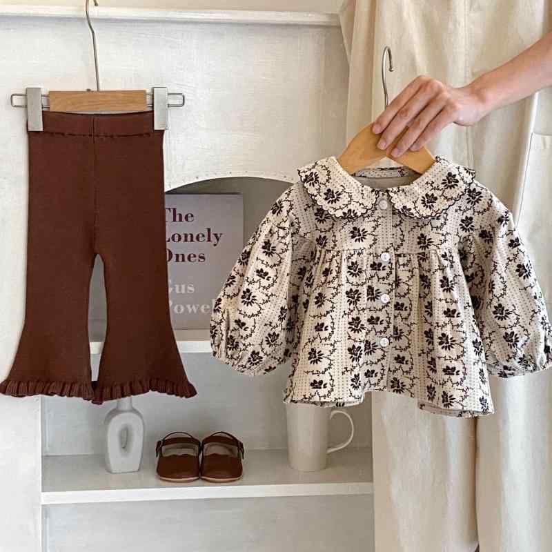 ・カテゴリ: 子供服セットアップ・対象: 女の子・スタイル: 韓国スタイル、欧米スタイル・セット内容: 2点セット・対象年齢: 1～3歳・袖丈: 長袖・ボトムス丈: ロング丈・厚さ: 普通・柄: フラワー、プリント・素材: 綿・基準: ・カラー展開: ダークアプリコット、ダークブラウン・サイズ展開: 66cm、73cm、80cm、90cm、100cm
