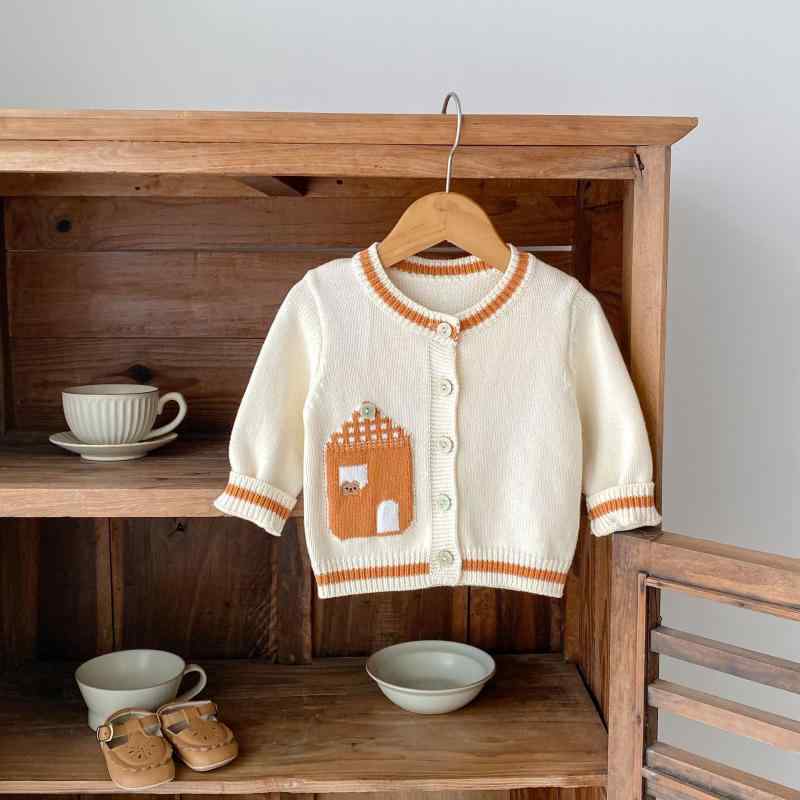・性別: 女の子・スタイル: カジュアル・対象年齢: 1〜3歳（80〜100cm）・厚さ: 普通・袖丈: 長袖・主な素材: 綿・基準: ・毛糸の太さ: 普通・ネックライン: クルーネック・カラー展開: アプリコットホワイト・サイズ展開: 66cm、73cm、80cm、90cm、100cm