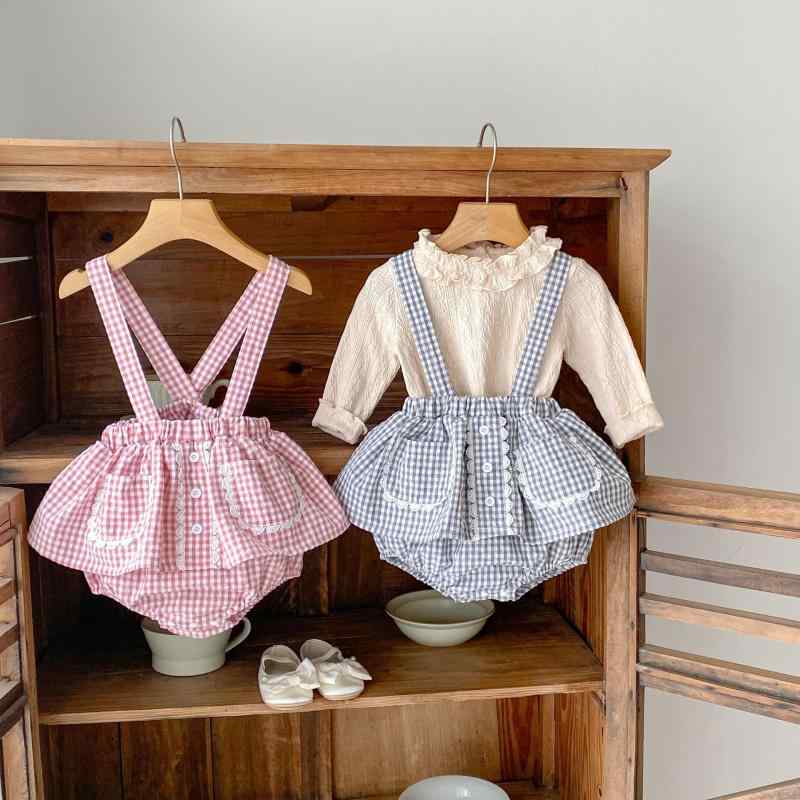 ・カテゴリ: 子供用セットアップ・対象性別: 女の子・スタイル: カジュアル・セット内容: トップス、パンツ・セット数: 2点セット・対象年齢: 1歳-3歳・袖丈: 長袖・ボトムス丈: ショート丈・生地の厚さ: 普通・柄: 格子柄、無地・素材: トップス（ポリエステル95%、ポリウレタン5%）、パンツ（ポリエステル50%、綿50%）・カラー展開: ピンクチェック、グレーチェック、アプリコット・サイズ展開: 73cm、80cm、90cm、100cm、110cm