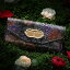 「大人になった少女を迎える、不思議の森の花たち。フルッティディボスコ Salu Voce（サルー ヴォ?チェ） 財布 レディース 長財布 ギャルソンウォレット 個性的 花柄 フラワーモチーフ アートレザー ブラック」を見る