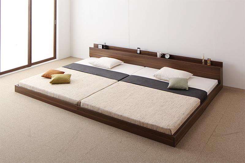 【組立設置料込み】将来分割して使える 大型 モダン フロアベッド 【LAUTUS】ラトゥース 【スタンダードポケットコイルマットレス付き】 ワイドK200(S+S) 【フレーム色】ウォルナットブラウン 【マットレス色】ホワイト ベッド本体【サイズ】セミシングル：（約）幅86×長さ215x高さ45cmシングル：（約）幅106×長さ215x高さ45cmセミダブル：（約）幅126×長さ215x高さ45cmダブル：（約）幅146×長さ215x高さ45cmクイーン（SSxSS）：（約）幅172×長さ215x高さ45cmキング（SSxS）：（約）幅192×長さ215x高さ45cmワイドK200（SxS）：（約）幅212×長さ215x高さ45cmワイドK220（SxSD）：（約）幅232×長さ215x高さ45cmワイドK240（SDxSD）：（約）幅252×長さ215x高さ45cmワイドK260（SDxD）：（約）幅272×長さ215x高さ45cmワイドK280（DxD）：（約）幅292×長さ215x高さ45cm【材質】化粧繊維板【機能】1口コンセント（1200W）【品質保証】1年間【生産国】中国【梱包サイズ・重量】個口数：1 セミシングル：（約）88x48x19cm・24kgシングル：（約）108x48x19cm・26kgセミダブル：（約）128x48x19cm・28kgダブル：（約）148x48x19cm・31kg※各サイズ・重量は概算です。※本製品はお客様組立品です。プラスドライバーをご用意ください。※製品のデザイン・仕様・梱包は予告なく変更することがございます。あらかじめご了承ください。※写真の色調はモニターの機種や設定により実際の商品と異なる場合があります。※本製品はコイルマットレス使用時の基準で強度計算されております。床板の上に必ずコイルマットレスを敷いてご使用ください。●スタンダードポケットコイルマットレス●【サイズ】セミシングル：（約）幅80×長さ195×高さ15cmシングル：（約）幅97×長さ195×高さ15cmセミダブル：（約）幅120×長さ195×高さ15cmダブル：（約）幅140×長さ195×高さ15cm【主な材質】線径2.0mmポケットコイル（コイル数／セミシングル：372、シングル：465、セミダブル：589、ダブル：682）中材：ウレタン側地：ポリエステル（片面多針キルティング加工）【品質保証】3年間【生産国】中国【梱包サイズ・重量】セミシングル：（約）81×33×33cm・16kg、シングル：（約）33×33×98cm・20kg、セミダブル：（約）33×33×121cm・25kg、ダブル：（約）33×33×141cm・28kg※ロールパッケージでお届けします。※片面仕様ですので、裏面でお使いいただくと不織布が破れることがございます。　ご注意ください。※マットレスを長くご愛用いただくために、1〜3ヶ月に一度頭と足の位置を入れ　替えることをおすすめします。フロアベッド/大型ベッド/ファミリーベッド/家族ベッド/マットレス付き/マットレスセット