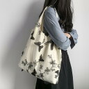 トートバッグ バッグ 鞄 肩掛け 手提げ 2way レディース 女性用 柄あり 大容量 花 フラワー デイジー 蝶々 白 黒 バタフライ ポケット ファスナー チャック 軽量 春夏 シンプル カジュアル 普段使い 個性的 存在感 旅行 お出かけ 高級感