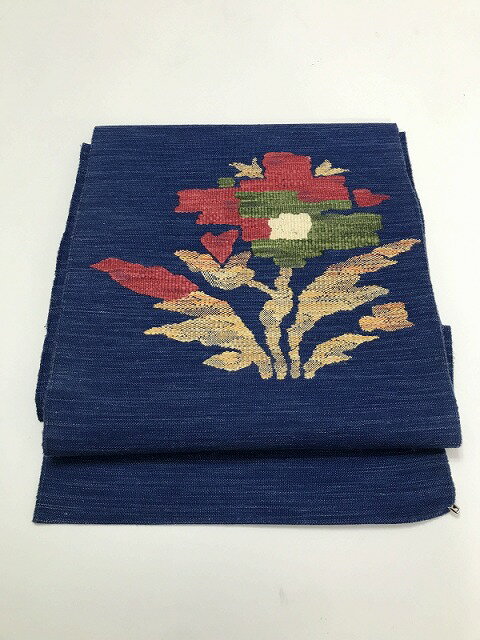 商品説明：ざっくりとした濃紺地に絣調の織成しお太鼓柄八寸名古屋帯 サイズ：幅約29.5、長さ約333cm 素材：正絹 状態：ランク3クスミ 擦れ シミ有 TPO：仕事着 普段着等 ※帯のみの販売となります