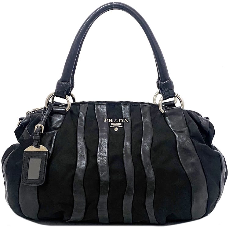 【送料無料】 プラダ トートバッグ ブラック シルバー BL0538 美品 ナイロン レザー 中古 PRADA 黒 ストライプ ファスナー シンプル 定番 人気 異素材 ロゴ ワンポイント シルバー金具 レディース メンズ ユニセックス 男女兼用 お洒落 高級感 上品 ブランド 本物 鑑定済み