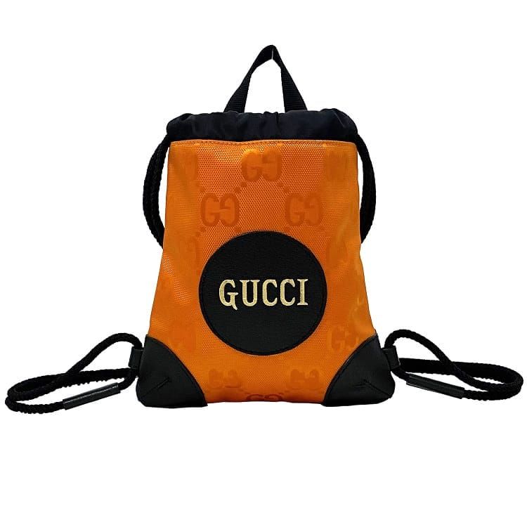 グッチ ミニ リュック オレンジ ブラック オフザ グリット 643887 未使用 美品 キャンバス レザー Sランク GUCCI ミニ バックパック GG 巾着 定番 人気 ロゴ 総柄 ナイロン 黒 コンパクト お洒落 高級感 上品 カジュアル アクセント ブランド 本物 鑑定済み