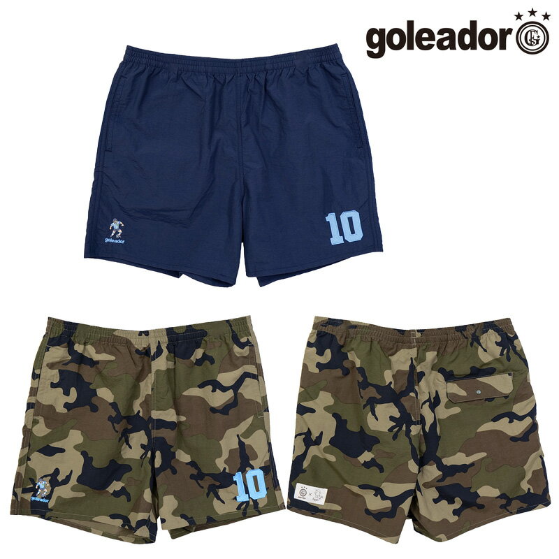 goleador のレジェンドNo.10 バーサタイルショーツ（アルゼンチン）！ ゴレアドールのカジュアルハーフパンツです。 人気のレジェンドシリーズがワンポイント刺繍となって登場。 左裾にはレジェンド達の背番号No.10が刺繍されています。 後ろ左裾には「MORI ARTWORKS」と goleador のコラボタグが付いています。 街穿きや水辺での使用も可能な、多目的ナイロンショーツ。 ややハリのある、ピステのような生地感です 両サイドポケットあり 右ヒップフラップポケットあり ウエスト紐あり 貼り絵を中心とするイラストで活動するデザイナー 「MORI ARTWORKS」と　goleador のコラボレーションシリーズ。 どこか温かみを感じる 独特なタッチが特徴的な森氏のイラストを活かした商品です。 セット対応トップス ・レジェンドNo.10 Tシャツ（アルゼンチン） material ナイロン100％ size M　　総丈39.5cm　股下12cm　ウエスト幅38cm L　　総丈40.5cm　股下12cm　ウエスト幅40cm LL　総丈41.5cm　股下12cm　ウエスト幅42cm note ・店頭や他のネットショップでも販売しております。 ・ご注文のタイミングによって欠品の場合がございます。 ・サイズは商品により若干の誤差がございます。 ・ご利用の機器によっては実際の商品と色みが異なる場合がございます。 ・ご理解の上、お買物いただきますよう宜しくお願いします。