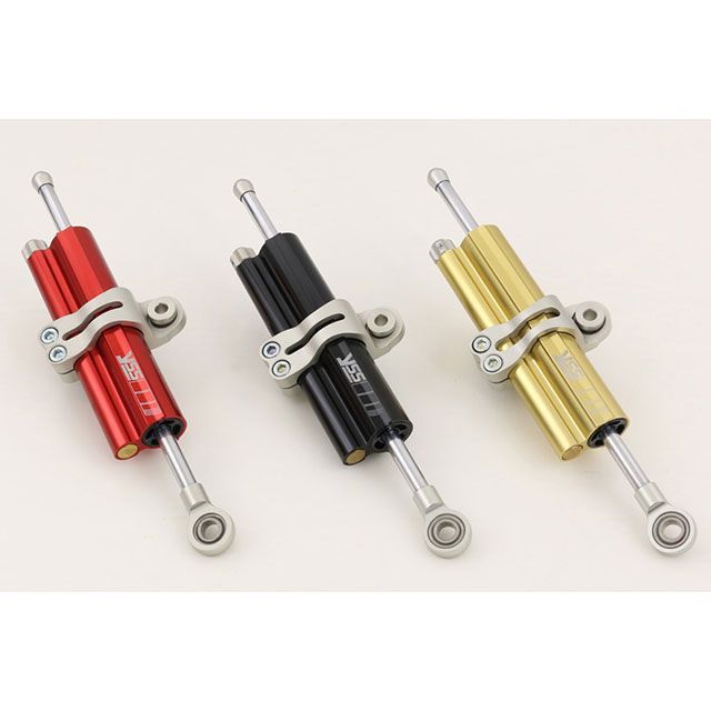 ●メーカー名：YSS / YSS RACING(ワイエスエスレーシング)●商品名：ステアリングダンパー ECI-88 B-Clamp●カラー：レッド 有効ストローク：75mm●メーカー品番：124-8810003●JANコード：4589641357354●タイプ【ECI88】通常時から急激なステアリングへの外部入力時まで常に一定した減衰力を発生させます。●仕様減衰力：30段階調整 付属クランプ：B●備考美しいデザインのボディに、ミクロン単位で鏡面研磨されたハードクローム仕上げのロッドを組み合わせるステアリングダンパー。その動きはどこまでもスムーズながらも、ハンドルに迫る急激な外部入力を緩和しオートバイの走行安定性能を向上させ、ライダーに絶対的な安心感とセルフコントロールを与えます。車種年式型式・フレームNo.その他汎用※商品掲載時の適合情報です。年式が新しい車両については、必ずメーカーサイトにて適合をご確認ください。