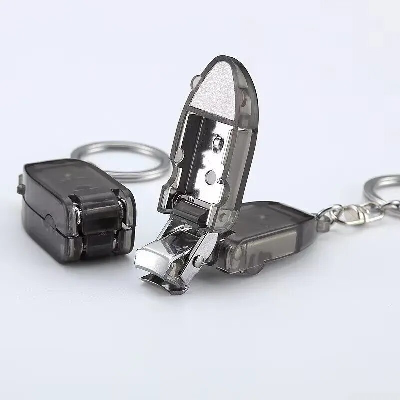 2023ポータブルネイルクリッパープラスチックハンドル回転式ネイルクリッパーキーリング付き中国工場