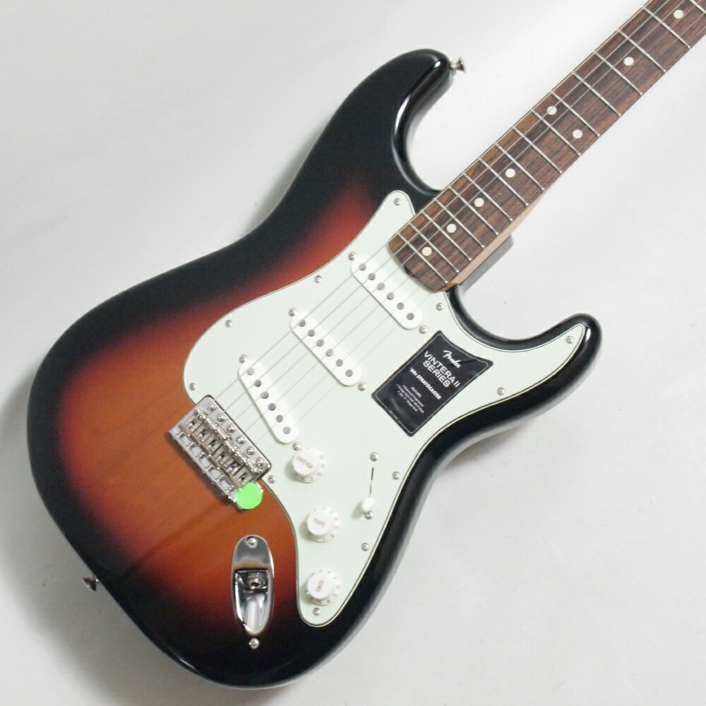 Vintera® II 60s Stratocaster®は、60年代のタイムレスなサウンドを現代に蘇らせ、フェンダーならではのアイコニックなルックス、インスピレーション、比類ないトーンを提供します。Vintera® II 60s Stratocaster®は、アルダーボディとローズウッド指板のメイプルネックを採用し、パンチと透明感に溢れたクラシックなフェンダートーンを実現します。スリムな"C"シェイプネックは、60年代モデルのネックプロファイルを元に設計されており、直感的で快適な演奏性を提供します。7.25インチラジアス指板とヴィンテージトールフレットにより、大胆なベンディングや繊細なビブラートが可能で、ヴィンテージの快適さが得られます。3基のヴィンテージスタイル'60sピックアップは、煌びやかさと温かみのあるクラシックなフェンダーサウンドを提供します。ヴィンテージスタイルのシンクロナイズドトレモロにより表情豊かなアーミングが可能で、ヴィンテージスタイルのチューニングマシンは、クラシックなルックスに加え、より細かいギア比とチューニングの安定性を向上させます。Vintera® II 60s Stratocaster®のクラシックなヴィンテージフィールと比類なきフェンダーサウンドで、あなたにしかできない、新たな音楽の歴史を刻み始めましょう。FEATURES・アルダーボディ・7.25インチラジアスのローズウッド指板、ヴィンテージトールフレット・'60s "C"ネックシェイプ・ヴィンテージスタイルMid-'60sピックアップ・ヴィンテージスタイルのベントスチールサドル付きシンクロナイズドトレモロ・ヴィンテージスタイルチューニングマシンModel Number: 0149020300Body Material: AlderBody Finish: Gloss PolyesterNeck: Maple, ‘60s “C”Neck Finish: Gloss UrethaneFingerboard: Slab Rosewood, 7.25” (184.1 mm)Frets: 21, Vintage TallPosition Inlays: White Dot (Slab Rosewood)Nut (Material/Width): Synthetic Bone, 1.650” (42 mm)Tuning Machines: Fender® Vintage-StyleScale Length: 25.5” (64.77 cm)Bridge: 6-Saddle Vintage-Style Synchronized Tremolo with Bent Steel SaddlesPickguard: 3-Ply Mint GreenPickups: Vintage-Style ‘60s Single-Coil Strat® (Bridge), Vintage-Style ‘60s Single-Coil Strat® (Middle),Vintage-Style ‘60s Single-Coil Strat® (Neck)Pickup Switching: 5-Position Blade: Position 1. Bridge Pickup, Position 2. Bridge and Middle Pickup, Position3. Middle Pickup, Position 4. Middle and Neck Pickup, Position 5. Neck PickupControls: Master Volume, Tone 1. (Neck/Middle Pickups), Tone 2. (Bridge Pickup)Control Knobs: Parchment PlasticHardware Finish: Nickel/ChromeStrings: Fender® USA 250L Nickel Plated Steel (.009-.042 Gauges), PN 0730250403Case/Gig Bag: Included: Deluxe Gig Bag