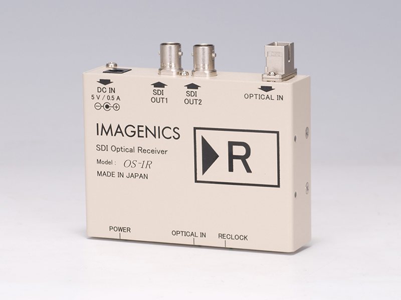 《 SDI 光受信器 》 ◆ IMAGENICS ( イメージニクス ) OS-1R［ 商品説明 ］ OS-1RはOS-1TもしくはOS-1TDから出力された光信号を3G-SDI、HD-SDI、SD-SDI、DVB-ASI 信号に変換する光受信器です。 受信器は高利得リミットアンプとリクロック機能により、光信号が減衰しても良好な信号再生を行います。 送信にはSDI光送信器OS-1TもしくはOS-1TDを使用し、長距離オプション仕様のOS-1TDをご使用の際は最大約50kmの伝送が可能です。 □特徴 3G-SDI、HD-SDI、SD-SDI、DVB-ASI信号に対応 エンベデッドオーディオもそのまま伝送可能 シングルモードまたはマルチモードファイバケーブルのどちらも使用可能 半導体レーザの故障や異常を検知し、LEDインジケータと送信器側のオープンコレクタ出力でアラーム発報 別売のラックマウント金具を使用することにより、1U に最大4 台までラックマウント可能 電源はACアダプタより給電。 &nbsp;［ 仕様 ］ 信号方式 SMPTE424M(3G-SDI)、SMPTE 292M(HD-SDI)、SMPTE 259M-C(SD-SDI)、EN50083-9(DVB-ASI)各規格準拠 適合光ファイバ、コネクタ仕様 ファイバ種別：シングルモードファイバ カテゴリー、コア径、クラッド：OS1相当時8.6〜9.5 &mu;m/125 &mu;m（寸法は参考値） 心数：1 研磨：PC研磨、SPC研磨、AdPC研磨、UPC研磨 コネクタ：SCコネクタ ファイバ種別：GIマルチモードファイバ カテゴリー、コア径、クラッド：OM3、OM2相当時50または62.5 &mu;m/125 &mu;m（寸法は参考値） 心数：1 研磨：PC研磨、 コネクタ：SCコネクタ 入力 光入力 (平均) レベル： -19.0 dBm 〜 0 dBm その他の仕様はOS-1Tの出力仕様に準じる 出力 SDI出力:0.8V(p-p)75&Omega; NRZ I・NRZ 1系統2分配(コネクタ：BNC) 伝送距離 GI マルチモード光ファイバコード使用時 最大 約1 km シングルモード光ファイバコード使用時 最大 約20 km シングルモード光ファイバコード使用時 各分岐 最大 3.5 km シングルモード光ファイバコード使用時 10 km 〜 約 50 km シングルモード光ファイバコード使用時 各分岐 最大 30 km シングルモード光ファイバコード使用時 各分岐 最大 10 km LEDインジケータ POWER( 電源), OPTICAL IN( 光信号入力), RECLOCK( リクロック) 電源 DC 5 V 0.5 A 消費電力 2.5 W (最大) 質量 約 280 g 外形寸法 幅100 mm&times;高さ25 mm&times;奥行75 mm(突起物を除く) 付属品 AC 100 V 27 VA 50 Hz ・ 60 Hz 国内専用ACアダプタ 1台 (5 V 2.3A 出力) HDMI コネクタ抜け止め金具(CL-1) 1 個 光減衰器 (- 10 dB) 1 個( ※長距離オプション品のTXに付属) 備考：ラックマウントには別売のMK-104A が必要です。 ※仕様及び外観は、改良のため予告なく変更することがありますので、予めご了承ください。　