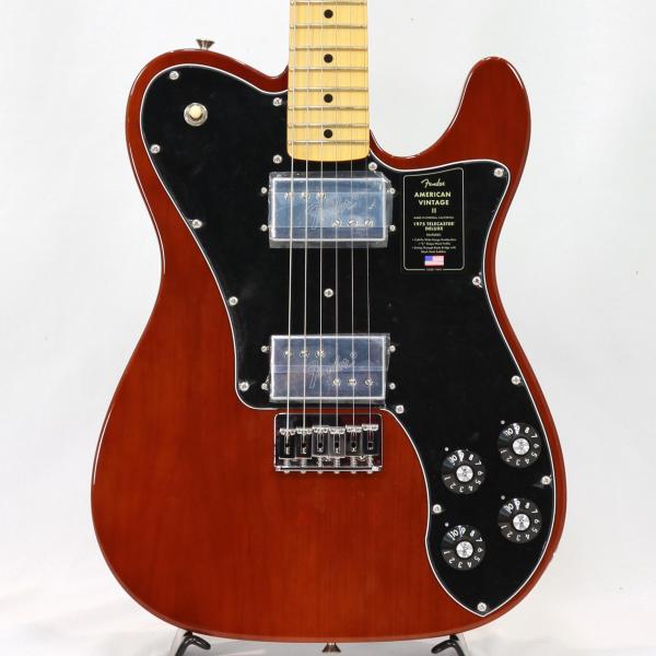 American Vintage IIは、音楽の歴史を変えた革新的なエレクトリックギターとベースを、極めて正確に再現したシリーズです。当時の仕様を忠実に反映したボディシェイプ、ネック、ハードウェア構成、プレミアムなフィニッシュ、そして年代別にヴォイシングされ細部にまでこだわり抜いたピックアップを搭載し、本物のFenderクラフトマンシップとトーンのエッセンスを凝縮した一本です。 Telecasterファミリーの最上位モデルとして1972年に発表されたTelecaster Deluxeは、フェンダーが初めて2基のハムバッカーを搭載したソリッドボディギターです。American Vintage II 1975 Telecaster Deluxeは、Stratocasterスタイルのラージヘッド、快適なバックカット、ピックガードにマウントされたWide Rangeハムバッカー、デュアルボリューム＆トーンコントロール、アッパーホーンに配された3ウェイトグルスイッチといった、オリジナルと同様のスペックを採用しています。Wide Rangeハムバッカーには、1981年に製造中止となったCuNiFeマグネットを復活させ、オリジナルのサウンドを見事に再現しています。 1975 "C"シェイプのメイプルネックを採用したAmerican Vintage II 1975 Telecaster Deluxeは、21本のミディアムジャンボフレットを配した9.5インチラジアスのメイプル指板を採用し、まるで1975年に舞い戻ったかのような、当時の楽器の演奏性を彷彿させます。本モデルは、ヘッドに配置された便利なBulletスタイルトラスロッドナット、Micro-Tilt付きの3ボルト式ネックプレート、6サドル式ハードテイルブリッジ、ステンレスブロックサドル、そして当時の仕様を忠実に再現したTele Deluxeチューニングマシンを装備しています。アルダーボディにBlack、Mocha Brown、3-Color Sunburstの3色をラインナップしています。 American Vintage IIは、フェンダーの礎を築いたギターとベースを忠実に復刻している、ヴィンテージフェンダーのトーンとフィーリングを愛するプレイヤーへ向けたシリーズです。音楽の歴史を作り上げてきたギターとベースを、現代の技術で蘇らせています。 ハードケース付属 画像は以前の入荷時に撮影したものです。お届けの商品とは木目や色合いが異なる場合がございます。 店頭及び他のサイトでも販売しています。買い物かごに入れても売り切れの場合がございます。 ご了承の上、ご注文ください。 -SPEC- ■Body Material: Alder ■Body Finish : Gloss Polyurethane ■Neck: Maple, 1975 "C" ■NeckFinish: Gloss Polyurethane ■Fingerboard: Maple- 9.5" (241 mm) Radius ■Frets: 21, Medium Jumbo ■Position Inlays: Black Dot ■Nut ( Material/Width ): Bone, 1.650" (42 mm) ■Tuning Machines:Pure Vintage Fender &ldquo;F&rdquo; Stamped ■Scale Length: 25.5" (64.77 cm) ■Bridge: Pure Vintage 6-Saddle String-Through Body Hardtail with Stainless Steel Block Saddles ■Pickguard: 3-Ply Black/White/Black ■Pickups: Authentic CuNiFe Wide-Range Humbucking (Bridge, Neck) ■PickupSwitching: 3-Position Toggle: Position 1. Bridge Pickup, Position 2. Bridge and Neck Pickups, Position 3. Neck Pickup ■Controls: Volume 1. (Neck Pickup), Volume 2. (Bridge Pickup), Tone 1. (Neck Pickup), Tone 2. (Bridge Pickup) ■Control Knobs: Skirted Black Plastic with Numbered Indicators ■Hardware Finish: Nickel/Chrome &nbsp;