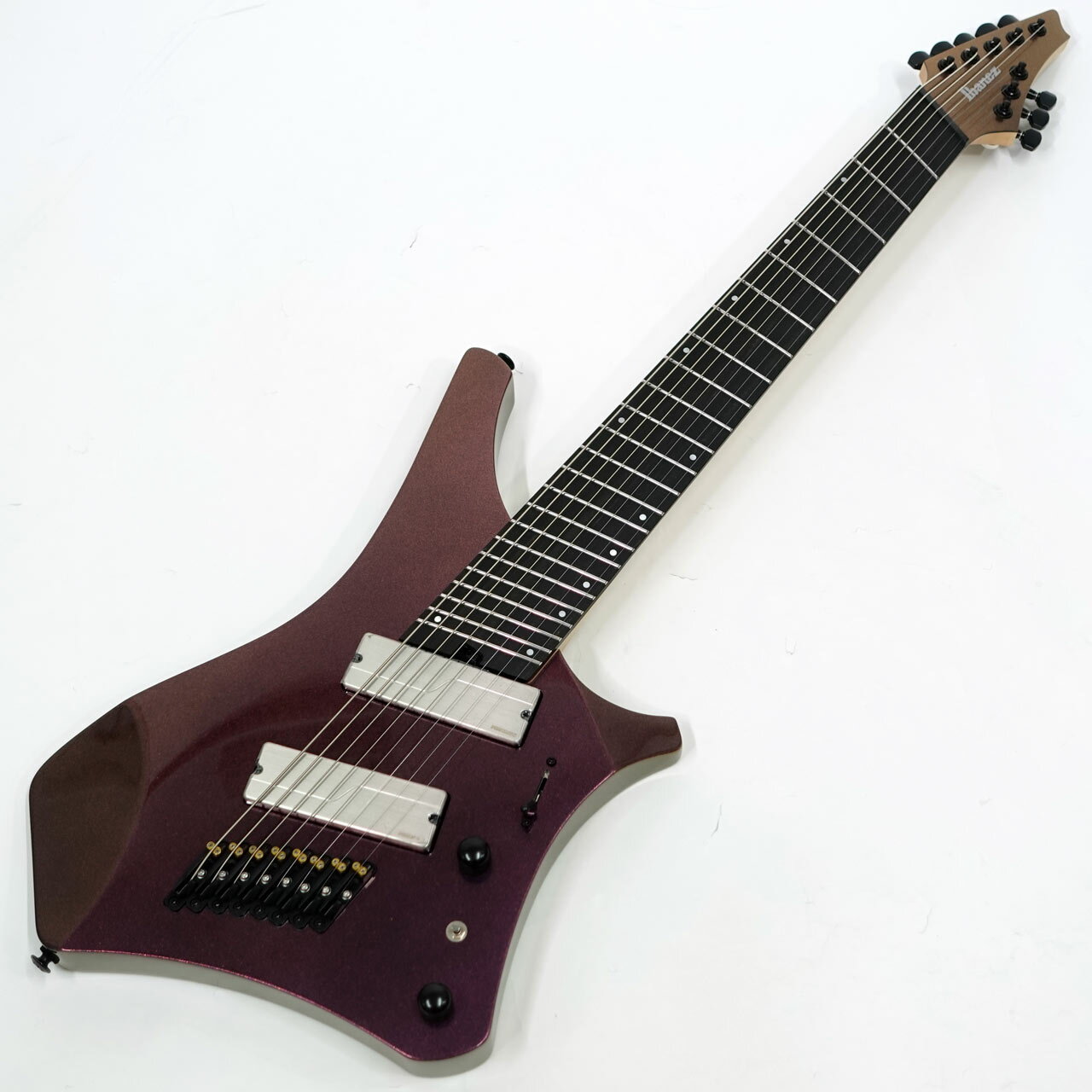 Ibanezが送る、今を生きるモダンメタル・プレイヤーに向けた新シリーズ &ldquo;ALPHA&rdquo;が登場。 一目でそれと分かる、究極の機能美を追求したエルゴノミック・フォーム。立奏でも座奏でも、まるで身体に同調するかのように馴染むフィット感が、奏者の感性をダイレクトに指先へと伝えます。 その高い演奏性を支えるのは、ハイ・フレットの限界を感じさせない新設計のネック・ジョイント。 そして、マルチスケール構造がもたらす適度なテンション感によって、重厚感と精緻感が共生する、濁りのないトーンを描き出します。 アメリカンバスウッドボディ、メイプル/ウォルナット5Pネック、エボニー指板、ジャンボステンレスフレット。 Parallel Wizard AS 5pc Maple/Walnut neckは低音弦側に向かって緩やかな丸みを帯びる非対称形状を採用しつつ、ネックの全長に渡って21mmの厚みで統一したネックシェイプです。スウィープ奏法やスキッピング奏法などのテクニカルな奏法を容易にする自然なグリップ感を追求しています。 メンテナンス性に優れるステンレス製フレットは音の立ち上がりが早く、コード弾きでも分離が良く、単音弾きでもクリアな出音を特長としています。また、軽いタッチで押弦でき、速いパッセージを弾いたり、スムーズなチョーキングを行える点に優れている、ジャンボサイズを採用しています。 特徴的なジョイントプレートはステンレス製のオーバル・プレートを用いた2本のネジに、ボディから直接打ち込まれる1本のネジを加えた、ユニークな3点止めボルト・ジョイントを採用しています。強度を確保しながらも、ハイ・フレットへのアクセス性と演奏性を飛躍的に高めています。 その他Gotoh製MG-Tロックチューナーやモノレールブリッジ、リアアウトプットジャックなど演奏性を高めたスペックが盛り込まれています。 ノイズを極限まで排しながら、アグレッシブなトーンとパワフルなアタックを実現した、Fishman Fluence Modern Humbuckerピックアップを搭載、Fishman Fluence Voicing switchにより、ヴォイシングの切り替えが可能です。 多弦ギターの新たな地平を切り開く&ldquo;ALPHA&rdquo;お試しください。 weight 3.200 kg ギグバック付属 撮影環境、パソコン環境により色味は異なる場合もありますが、杢目は画像の商品でのお届けとなります。 他のサイトでも販売しています。買い物かごに入れても売り切れの場合がございますのであらかじめご了承下さいませ。 SPEC neck type Parallel Wizard AS-8 5pc Maple/Walnut neck&nbsp; top/back/body American Basswood body&nbsp; fretboard Ebony fretboard Mother of Pearl Step off-set dot inlay&nbsp; fret Jumbo Stainless Steel frets&nbsp; number of frets 24&nbsp; bridge Mono-rail G2 bridge&nbsp; string space 10.8mm&nbsp; neck pickup Fishman Fluence Modern Humbucker Alnico 9 (H) neck pickupActive/Alnico&nbsp; bridge pickup Fishman Fluence Modern Humbucker Ceramic 9 (H) bridge pickupActive/Ceramic&nbsp; factory tuning 1E,2B,3G,4D,5A,6E,7B,8F# strings D'Addario EXL120-8 string gauge .009/.011/.016/.024/.032/.042/.054/.065&nbsp; hardware color Black NECK DIMENSIONS Scale : 698mm/27.5" - 648mm/25.5"&nbsp; a : Width 55mm at NUT&nbsp; b : Width 78mm at 24F&nbsp; c : Thickness 21mm at 1F&nbsp; d : Thickness 21mm at 12F&nbsp; Radius : 508mmR&nbsp;