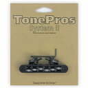 TP6Rは、TonePros設計のローラーサドルを採用することで、Bigsbyスタイルのトレモロが付いたギターで優れたパフォーマンスを提供します。 ナッシュビル・スモール・ポスト・タイプのTOM(Tune-O-matic)ブリッジで、多くのアメリカ製のギターに搭載可能なブリッジです。 弦高、イントネーション調整後、ブリッジ本体とスタッドをイモネジで固定する独自の特許取得済み《System》構造により、ブリッジのがたつきがなくなり弦の振動をしっかりボディーに伝え、イントネーション、サスティンが向上します。 またブリッジが固定されている事で、弦交換の際ブリッジが外れる事がなく弦交換前のイントネーション、弦高が保たれます。 【注意点】 図面を参照し、サイズを確認して下さい。 ToneProsをギター本体へ加工無しで取り付けができない場合は、楽器店、リペアショップ等にご相談して頂くようお願い致します。 無理に交換・取り付けをすることによって、ギターに損傷・故障、また思わぬ怪我をする場合があります。 そのような場合、当社ではTonePros商品の不具合以外は保証できかねますのでご了承ください。 【スペック】 Radius: 約304.8mm / 12インチ ※1弦ー6弦のサドルのR Saddle material: Zamak ※亜鉛に，約4％のアルミニウムと，少量の銅，微量のマグネシウムを添加した亜鉛合金 Wrench: 1.5mm