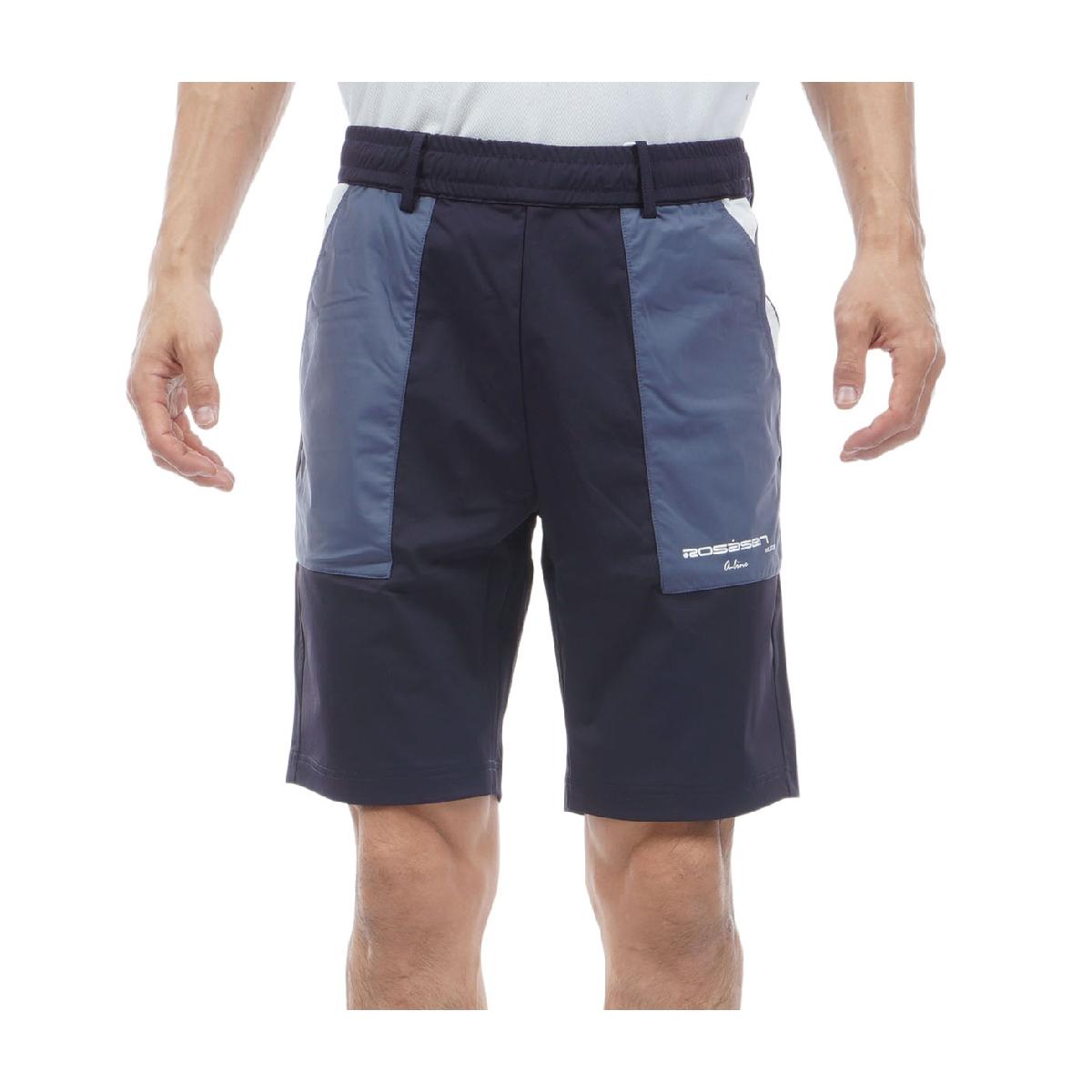 ストレッチ A-Line ストレッチショートパンツロサーセン / ROSASEN商品の特徴ナイロンストレッチショートパンツ。ナイロンジャージ素材を使用し、ストレッチ性とUVカット機能を兼ね備えた一着。ナイロン特有の冷たさが心地よく、夏のゴルフシーンにぴったりの素材感。スポーティーな3配色の切り替えが目を引き、洗練された印象を与えるデザイン。ウエストはゴム仕様で、フィット感と動きやすさを追求。ポケット部分のデザインがアクセントとなり、機能性とスタイルを両立。サーフ＆ターフのライフスタイルを体現するこのショートパンツは、同シリーズのパンツやレイヤードの長袖と合わせて、洗練されたセットアップを楽しむことができる。ゴルフ場でのプレーはもちろん、リラックスした休日にも活躍する、エイジレスな魅力を持つ一着。素材ナイロン78％、ポリウレタン22％洗濯仕様手洗い可、ドライ不可機能UV、ストレッチサイズバリエーションM(48)、L(50)、LL(52)対象メンズ製造国中国シーズン2026年春夏モデル【メーカー公表推奨サイズ】(cm)M(48):身長167-173、胸囲89-95L(50):身長172-178、胸囲93-99LL(52):身長177-183、胸囲97-103【GDO計測実寸値】(cm)M(48):ウエスト(A)76、ウエスト(B)93、ヒップ98、股上29.5、股下22、わたり幅33L(50):ウエスト(A)80、ウエスト(B)97、ヒップ102、股上30、股下23、わたり幅34.5LL(52):ウエスト(A)82、ウエスト(B)102、ヒップ107、股上30、股下24、わたり幅36※伸縮素材やデザインによってメーカー公表推奨サイズより実寸値が小さい場合がございます。※実際に採寸した数値を掲載しております。商品タグにはメーカー推奨サイズ（想定しているボディサイズ）が記載されており、実寸とは異なりますのでご注意ください。【実寸計測箇所】着丈 ：後ろ襟ぐり（襟の付け根）中央から後身頃裾口までの長さゆき丈：後ろ襟ぐり（襟の付け根）中央から肩先を通り袖口までの長さ身幅 ：脇部袖の付け根左右両端の長さウエスト(A)：履き口左右両端の長さを2倍ウエスト(B)：内股合わせ（※）から股上前面へ20cmの地点の左右両端の長さを2倍ヒップ ：内股合わせ（※）から股上前面へ15cmの地点の左右両端の長さを2倍股上 ：内股合わせ（※）から履き口上端までの長さ股下 ：内股合わせ（※）から内股の縫い目に沿った裾口までの長さわたり幅 ：内股合わせ（※）から水平方向に外側へ端まで結んだ長さ(※)パンツの股部分の左右の分かれ目の起点※GDO独自の採寸方法により計測を行っておりますため、多少の誤差が生じる場合がございます。ssnew gwbargainone gwbargainmallone gwbargaina
