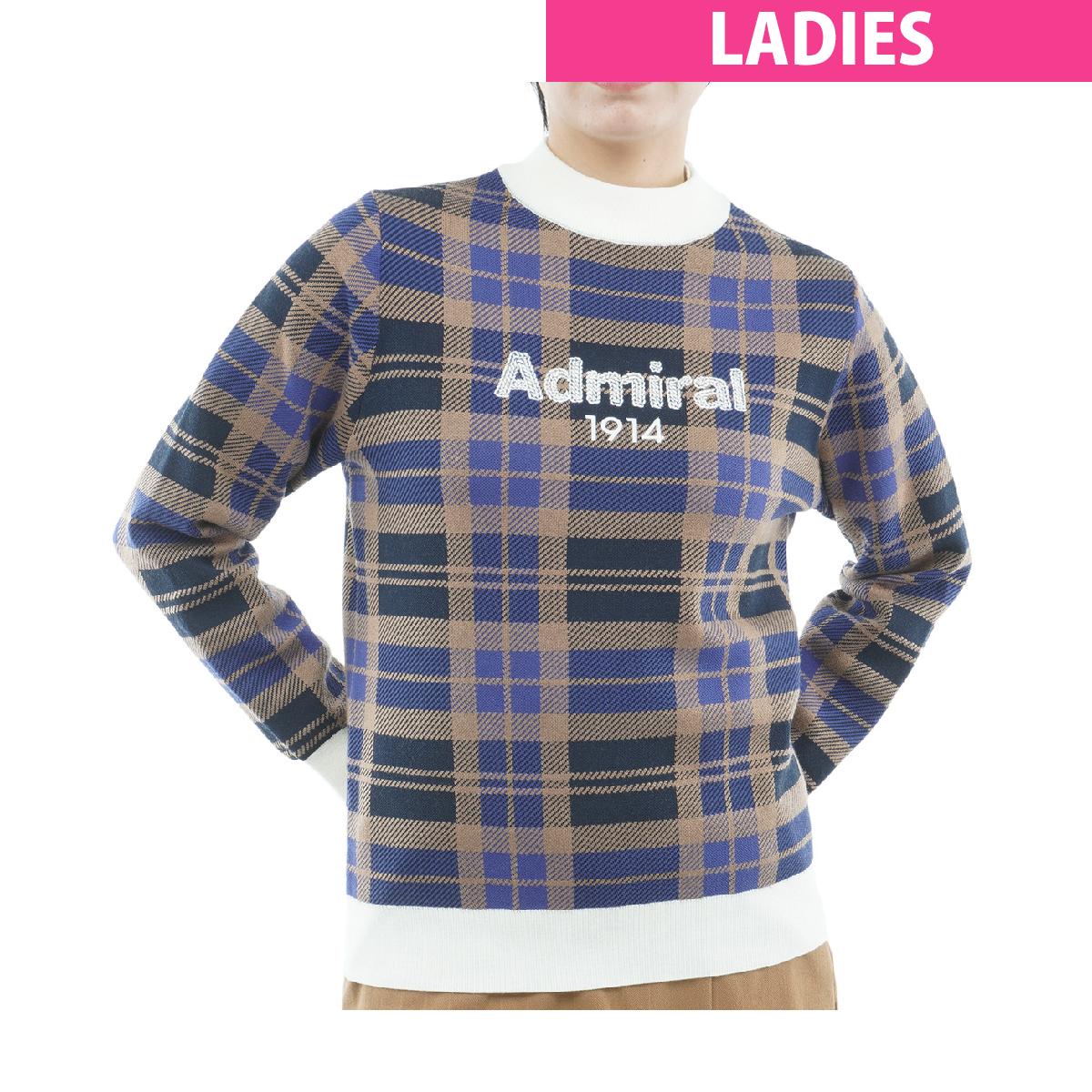 ジャカードチェック ボトルネックセーターアドミラル / Admiral商品の特徴ウール混の糸に軽量のポリエステル糸を合わせたチェック柄ジャカードのセーターです。ポリエステル糸を使用することで通常のジャカードセーターよりも軽く、乾きも早くなるように配慮しました。クルーネックよりも高めのボトルネックは締め付けがなく暖かいのが特徴です。シーズンテーマの「コッツウォルズ」に由来し、羊毛産業で栄えたコッツウォルズをイメージしたケーブル柄を取り入れた刺繍ロゴがポイントです。【洗濯仕様】・液温は40℃を限度とし、手洗いができる・塩素系および酵素系漂白剤の使用禁止・タンブル乾燥禁止・日陰の平干しがよい・底面温度110℃を限度として、スチームなしでアイロン仕上げができる・石油系溶剤による弱いドライクリーニングができる・非常に弱い操作のウェットクリーニングができる素材ポリエステル68％、ナイロン15％、アクリル13％、毛4％洗濯仕様商品の特徴参照機能静電気軽減リンキング糸使用サイズバリエーションM、L、LL対象レディス製造国中国シーズン2026年秋冬モデル【メーカー公表推奨サイズ】(cm)M:身長157-165、胸囲80-84L:身長160-168、胸囲82-86LL:身長163-171、胸囲84-88【GDO計測実寸値】(cm)M:着丈57.5、ゆき丈74、身幅48L:着丈59.5、ゆき丈77、身幅52LL:着丈60.5、ゆき丈77.5、身幅54.5※伸縮素材やデザインによってメーカー公表推奨サイズより実寸値が小さい場合がございます。※実際に採寸した数値を掲載しております。商品タグにはメーカー推奨サイズ（想定しているボディサイズ）が記載されており、実寸とは異なりますのでご注意ください。【実寸計測箇所】着丈 ：後ろ襟ぐり（襟の付け根）中央から後身頃裾口までの長さゆき丈：後ろ襟ぐり（襟の付け根）中央から肩先を通り袖口までの長さ身幅 ：脇部袖の付け根左右両端の長さウエスト(A)：履き口左右両端の長さを2倍ウエスト(B)：内股合わせ（※）から股上前面へ20cmの地点の左右両端の長さを2倍ヒップ ：内股合わせ（※）から股上前面へ15cmの地点の左右両端の長さを2倍股上 ：内股合わせ（※）から履き口上端までの長さ股下 ：内股合わせ（※）から内股の縫い目に沿った裾口までの長さわたり幅 ：内股合わせ（※）から水平方向に外側へ端まで結んだ長さ(※)パンツの股部分の左右の分かれ目の起点※GDO独自の採寸方法により計測を行っておりますため、多少の誤差が生じる場合がございます。fwnew