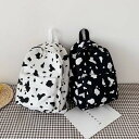 リュック レディース 牛柄 バッグ かばん 鞄 大容量 ウシ キャンバス リュックサック モノトーン 帆布 カジュアル 大人可愛い 個性的 おしゃれ シンプル ...