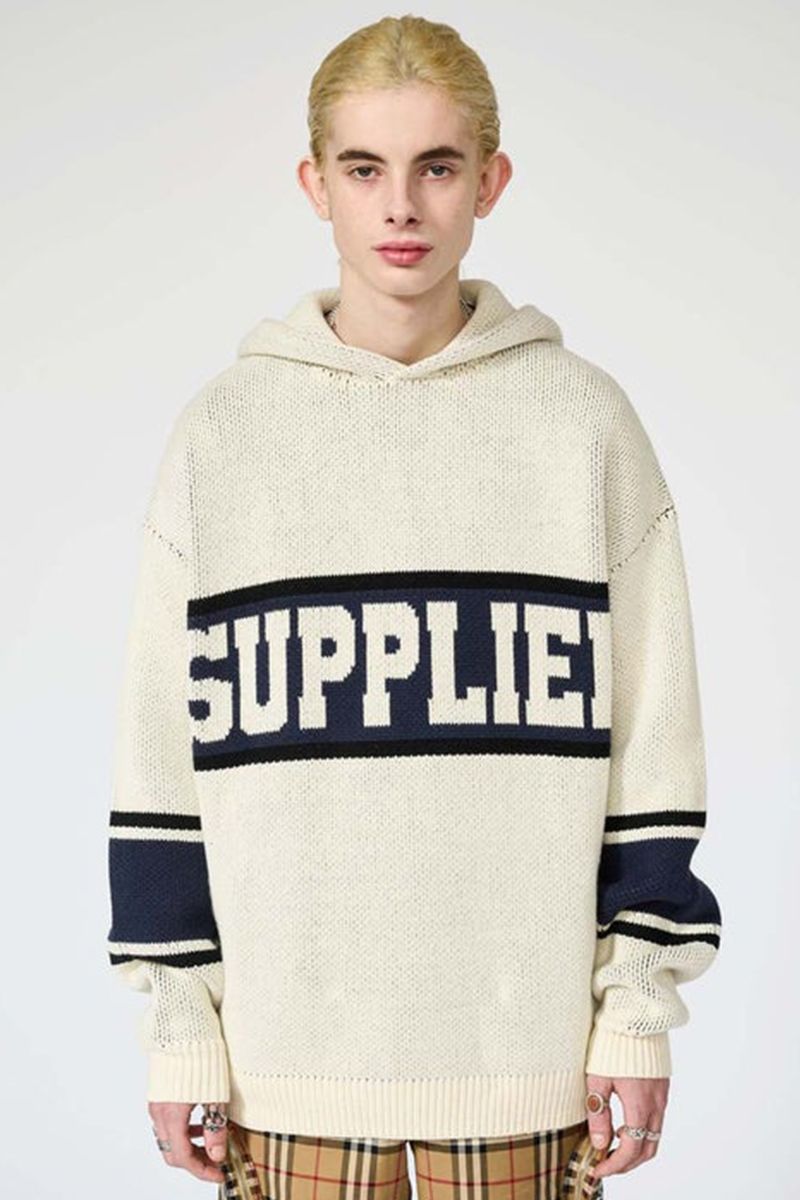 SUPPLIER (TvC[) COLLEGE LOGO KNIT HOODIE CREAM