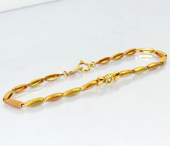 樂天商城 - ダイヤモンド-0.05ct リボンデザイン K18YG ブレスレット 【店頭受取対応商品】