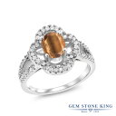 ブランドGem Stone King （ジェムストーンキング）商品名1.62カラット 天然 タイガーアイ 指輪 リング レディース シルバー9251.62 Ct Oval Brown Tiger Eye 925 Sterling Silver Ringジェムストーン1.25カラット 天然 ブラウン タイガーアイ (8mm x 6mm)オーバル カット0.01カラット ホワイト ジルコニア (1mm x 1mm) 総カラット数1.62カラット (合計 32粒)金属の素材シルバー925 刻印入り金属アレルギーフリー ニッケルフリーセッティング4本爪 セッティング付属品ジュエリーボックス・品質保証カード・手さげバッグ品番MGZ-1772-OV-TE-BR-CZ-W-SSタイガーアイ「虎目石」とも呼ばれるタイガーアイは、金褐色の縞模様がトラの目の虹彩を思わせる、パワーストーンとして人気の石です。キャッツアイ効果という光の筋が魅力的な輝きを生み出すタイガーアイは、古くから、虎の目はすべてを見通すとして、洞察力や決断力を養い、仕事運や金運を高めて成功へと導いてくれると言われています。Gem Stone King（ジェムストーンキング）創業115年を超える、世界が認める「天然石の王」定番からトレンドまでおしゃれなデザインが世界的に人気のジュエリーブランド高品質の天然石をお求め安い価格で販売！海外「ニューヨーク」から直接お届けしております● 普段使いやご褒美に20代、30代、40代、50代と幅広い年代の大人の女性にぴったり似合う贅沢な高級感デイリーに、オフィス カジュアルに、お呼ばれなどのフォーマルにも使える、上品できれいめなデザイン● 大切な女性（妻、嫁、彼女）へのプレゼントに結婚・婚約、結婚記念日、誕生日プレゼント、夫婦の記念日にクリスマス、ホワイトデー、バレンタインデー、母の日のギフトに仲良しな女友達へのサプライズギフトに還暦のお祝い、成人・入学・卒業のお祝いの贈り物にもおすすめ● 幸運のお守りにパワーストーンとしても人気の宝石たちは、お守りとしても世界中で愛用されていますあなたのお気に入りのカラーストーンを毎日のラッキーアイテムに！＊ GemStoneKingの正規品、生涯保証でお修理も可＊ 金属アレルギーフリー ニッケルフリーで安心天然タイガーアイシルバー925 カクテルリング1.25カラットの天然タイガーアイとシルバー925でお作りするカクテルリング。ホワイト ジルコニアをアクセントストーンに添えた、魅力的なカラーコンビネーションがおしゃれなジュエリー。宝石を高い位置にキープし輝きを最大限に引き出す4本爪セッティングがタイガーアイをより美しく鮮やかに引き立たせます。エンゲージリング・マリッジリングに最適です。20代、30代、40代、50代と幅広い年代にぴったり似合う、上品で贅沢な高級感がおすすめです。普段使いや特別な装いに、シーンを選ばずお使いいただけます。ブランドGem Stone King （ジェムストーンキング）商品名1.62カラット 天然 タイガーアイ 指輪 リング レディース シルバー9251.62 Ct Oval Brown Tiger Eye 925 Sterling Silver Ringジェムストーン1.25カラット 天然 ブラウン タイガーアイ (8mm x 6mm)オーバル カット0.01カラット ホワイト ジルコニア (1mm x 1mm) 総カラット数1.62カラット (合計 32粒)金属の素材シルバー925 刻印入り金属アレルギーフリー ニッケルフリーセッティング4本爪 セッティング付属品ジュエリーボックス・品質保証カード・手さげバッグ品番MGZ-1772-OV-TE-BR-CZ-W-SSタイガーアイ リング で探す人気ランキングから探す