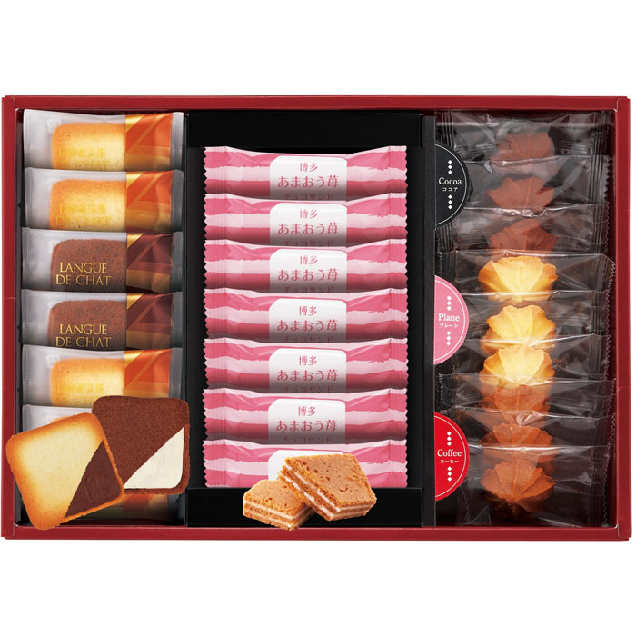 《1箱の内容》 内容／はかたあまおう苺チョコサンド×7・絞りクッキー（ココア・プレーン・コーヒー）各3・ラングドシャ（プレーン×4枚・チョコ×2枚） 箱サイズ／210×295×45mm 製造地：日本 福岡名産あまおうを使用した、ほどよい甘さの「博多あまおう苺サンド」に、サクッとした食感のクッキーにホワイトクリーム・チョコレートクリームをサンドした「ラングドシャ」、プレーン・ココア・コーヒー3種類の味が楽しめる可愛らしい「絞りクッキー」の詰合せ。ギフト対応