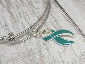 ティール アウェアネス リボン バングル Peridot RISING Teal Awareness Ribbon Bangle ティール アウェアネス リボン バングル Peridot RISING Teal Awareness Ribbon Bangle