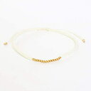 ɃVo[r[YRbgXgOƃS[h̃AWX^uthVbvuXbgiN[j Metal Studio Jewelry Adjustable friendship bracelet in cotton string and gold plated on silver beads at the center(Cream