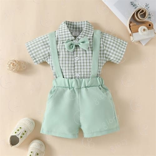 子ども服 男の子 ベビー服 夏服 セットアップ フォーマル ギンガムチェック 蝶ネクタイ 半ズボン 半袖 シャツ ロンパース おしゃれ 結婚式 上下セット 蝶ネクタイがおしゃれ?夏のフォーマルセット 【素材】ポリエステル【サイズ】■3M?着丈：41cm?肩紐：20cm?バスト：51cm?ウエスト：38cm?ヒップ：50cm?袖丈：9cm?パンツ丈：20.5cm?推奨月齢：0-3ヶ月■6M?着丈：43cm?肩紐：21cm?バスト：53cm?ウエスト：39cm?ヒップ：53cm?袖丈：10cm?パンツ丈：21.5cm?推奨月齢：3-6ヶ月■9M?着丈：45cm?肩紐：22cm?バスト：55cm?ウエスト：40cm?ヒップ：56cm?袖丈：11cm?パンツ丈：22.5cm?推奨月齢：6-9ヶ月■12M?着丈：47.5cm?肩紐：23cm?バスト：57cm?ウエスト：41cm?ヒップ：59cm?袖丈：12cm?パンツ丈：23.5cm?推奨月齢：9-12ヶ月■18M?着丈：50cm?肩紐：24cm?バスト：59cm?ウエスト：42cm?ヒップ：62cm?袖丈：13cm?パンツ丈：24.5cm?推奨月齢：12-18ヶ月※サイズは1cm〜3cmほど誤差がある場合があります。【注意事項】?商品の細部仕様は予告なく変更になる場合がございます。?交換/返品対象外になります。?こちら商品ページは海外からのお取り寄せとなります。?検品のため一度開封してある場合がございます。?外箱や梱包材に輸送中の傷や凹み等ある場合がございます。 2子ども服 男の子 ベビー服 夏服 セットアップ フォーマル ギンガムチェック 蝶ネクタイ 半ズボン 半袖 シャツ ロンパース おしゃれ 結婚式 上下セット 蝶ネクタイがおしゃれ?夏のフォーマルセット 【素材】ポリエステル【サイズ】■3M?着丈：41cm?肩紐：20cm?バスト：51cm?ウエスト：38cm?ヒップ：50cm?袖丈：9cm?パンツ丈：20.5cm?推奨月齢：0-3ヶ月■6M?着丈：43cm?肩紐：21cm?バスト：53cm?ウエスト：39cm?ヒップ：53cm?袖丈：10cm?パンツ丈：21.5cm?推奨月齢：3-6ヶ月■9M?着丈：45cm?肩紐：22cm?バスト：55cm?ウエスト：40cm?ヒップ：56cm?袖丈：11cm?パンツ丈：22.5cm?推奨月齢：6-9ヶ月■12M?着丈：47.5cm?肩紐：23cm?バスト：57cm?ウエスト：41cm?ヒップ：59cm?袖丈：12cm?パンツ丈：23.5cm?推奨月齢：9-12ヶ月■18M?着丈：50cm?肩紐：24cm?バスト：59cm?ウエスト：42cm?ヒップ：62cm?袖丈：13cm?パンツ丈：24.5cm?推奨月齢：12-18ヶ月※サイズは1cm〜3cmほど誤差がある場合があります。【注意事項】?商品の細部仕様は予告なく変更になる場合がございます。?交換/返品対象外になります。?こちら商品ページは海外からのお取り寄せとなります。?検品のため一度開封してある場合がございます。?外箱や梱包材に輸送中の傷や凹み等ある場合がございます。 2