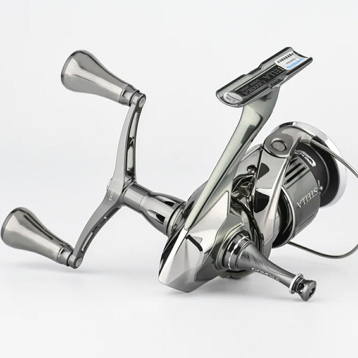 ゴメクサス(GOMEXUS)の【送料無料】 ゴメクサス リール スタンド R-EVO シマノ shimano ダイワ daiwa スピニング リール 用 カスタム パーツ リールスタンド 彫刻バージョン フック掛け ステラ向け ボディーキーパー アルミ 42mm Gomexus｜アングル3