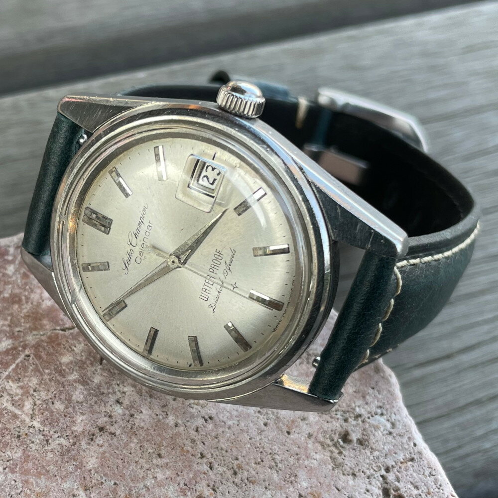 【中古品】【OH済み】SEIKO/セイコー Champion/チャンピオン カレンダー 19石 機械式 手巻き時計 精工舎亀戸工場 1963年 6月製造品 動作確認済み クリーニング/ケース磨き/風防磨き アンティークウォッチ 中三針 シルバー文字盤イタリアンレザーベルト付き