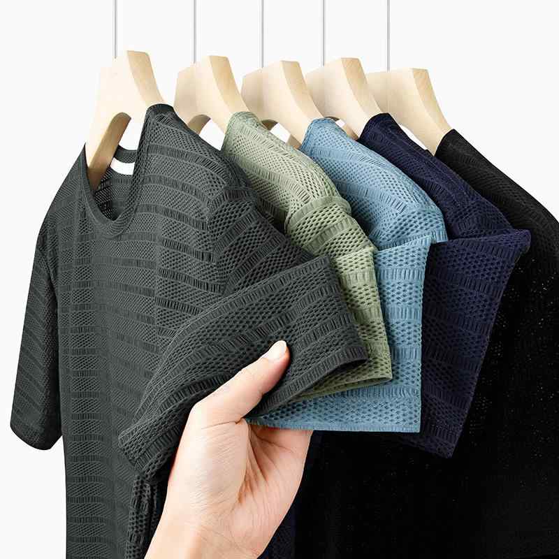 ・カテゴリ: Tシャツ・スタイル: ベーシック・主な素材: ナイロン80%、スパンデックス20%・柄: 無地・シルエット: スタンダードフィット・タイプ: プルオーバー・ネックライン: クルーネック・袖丈: 半袖・袖タイプ: レギュラー・厚さ: 薄手・適用シーン: 日常・デザイン詳細: 三本針・加工: イージーケア・カラー展開: ブラック、ダークグレー、フォグブルー、ネイビー、ダスティグリーン・サイズ展開: M、L、XL、2XL、3XL、4XL・重さ: 約180g～250g・素材機能: 通気性、防シワ、吸湿速乾・対象年齢層: 成人・対象性別: 男性