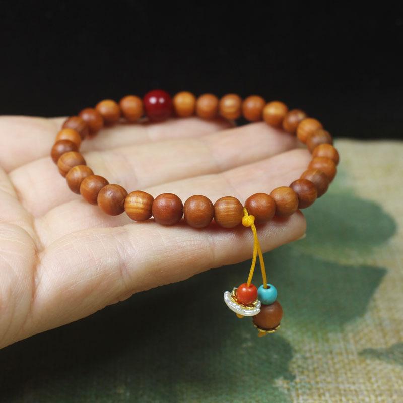 ブレスレット 男女兼用 柏木 天然木製 6mm 丸玉 研磨加工 艶やかな光沢 白い花片タッセル 数珠 念珠 パワーストーン お守り アクセサリー
