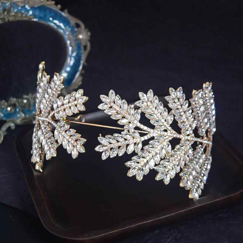 ヘッドドレス ヘアアクセサリー 新婦 花嫁 ウェディング ブライダル 結婚式 披露宴 パーティー クラウン ティアラ ラインストーン クリスタル リーフモチーフ 煌めく 豪華 華やか ゴージャス 上品 高級感 カチューシャ ヘッドバンド