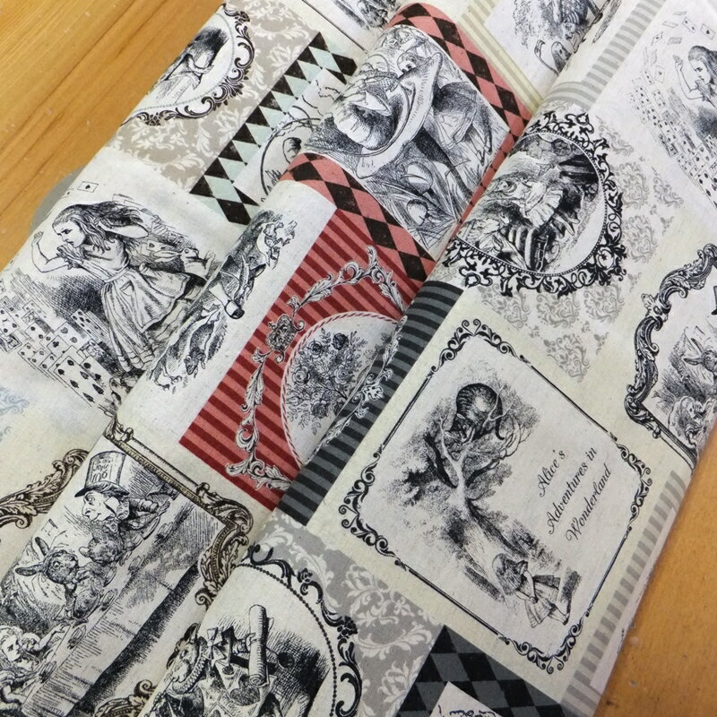 不思議の国のアリス くろすろ〜ど (綿麻 生地 布)