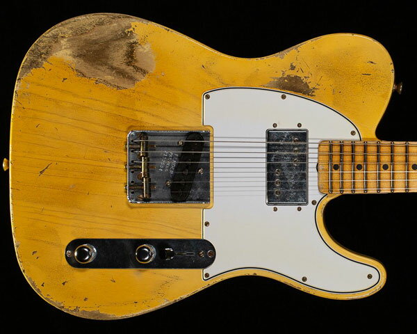 Description 1987年に設立され、最上級モデルを制作するために生まれたフェンダー・カスタム・ショップ（Fender Custom Shop）。マスタービルダーと呼ばれる巨匠達が製作を担当するマスタービルダー・シリーズやその他の多くのシリーズで厳選された木材選び、ピックアップのコイル巻きなど高い製作技術で作り上げられております。フェンダー社の長年の歴史と伝統が注ぎ込まれた世界中のミュージシャンから愛され続けるセクションです。 1951年の僅かな期間に存在していたFenderデカールのみの通称ノーキャスター（Nocaster）をベースに、1974年テレキャスター・カスタムの要素を注ぎ込んた夢のコラボレーション・ギター「1974/1951 Nocaster Heavy Relic」のご紹介です。本作の製作を手掛けたのが2018年、新たにマスタービルダーとして加わったロン・ソーン（Ron Thorn）。もともとインレイ・アーティストとしてキャリアを積んできた人物で、父と共に所属していたギターカスタマイズ会社『Thorn Inlay』のその高いクオリティのクラフトマンシップから、90年代半ばよりフェンダー・カスタム・ショップ唯一のインレイ職人として務めた凄腕ビルダーでございます。 ボディにはシャープな粒立ち感と心地良いレンジが迫力を生み出す厳選されたアッシュ材、25.5インチ・スケールのネックと21フレット仕様の指板には硬めでクリアかつ歯切れの良いメイプルを採用。ネックシェイプは太さを感じさせない握り心地の良い「1950 Blackguard」、フレットにはヴィンテージ・タイプより少し大きめでミディアム・サイズの「Medium Vintage」、指板にはローポジションからハイポジションに掛けて抜群の演奏性をお約束するコンパウンド・ラディアスをセレクトするなどストレスを感じることなくスムーズなフィンガリングを可能にいたします。 ピックアップ・システムにはHSレイアウトで、「Wide-Range CuNiFe Humbucking」とホセフィーナ女史によりハンドワウンド（手巻き）された「50-51 Blackguard」の組み合わせを搭載。「Wide-Range CuNiFe Humbucking」からはラージサイズのボビンとスレッド仕様のクニフェ（CuNiFe）マグネットを採用したピックアップで、スムーズで伸びやかなドライブ・サウンド、クリアで輪郭のはっきりとしたサウンドを生み出し、「50-51 Blackguard」からはテレキャスターらしい軽快なクリーン・トーンから力強いドライブまで対応して頂けます。さらにエイジング処理は、塗装が剥げて来た絶妙な風合いを演出する圧巻のヘヴィ・レリック加工はさすがはカスタムショップと言うに相応しい出来映え。そしてマスタービルト・シリーズを象徴するヘッド裏に記されたロン・ソーン氏のサインが入っているのも見逃せません。ロン・ソーン氏の妙技が十二分に楽しめる素晴らしい一本に仕上がっております。 Specification Body Shape: 51 Nocaster Body Material: Ash 2-Piece Body Finish: Lacquer Neck Material: Maple Neck Shape: 1950 Blackguard Scale Length: 25.5" (648 mm) Fingerboard Radius: 7.25" to 9.5" Compound Radius (184 mm to 241 mm) Number of Frets: 21 Fret Size: Medium Vintage / 47095 String Nut: Bone Nut Width: 1.630” (41.4 mm) Neck Finish: Lacquer Fingerboard: Maple Position Inlays: Black Dot Bridge Pickup: Josefina Hand-Wound '50-'51 Blackguard Neck Pickup: Wide-Range CuNiFe Humbucking Controls: Master Volume, Master Tone Pickup Configuration: HS Bridge: Vintage style, 3-saddle bridge Tuning Machines: Vintage Style Orientation: Right-Hand Hardware Finish: Nickel/Chrome Pickguard: 3-Ply White Control Knobs: Knurled Dome Switch Tips: Barrel Style Strings: Nickel Plated Steel (.010-.046 Gauges)