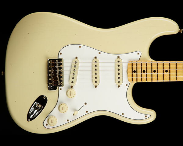 Description 1987年に設立され、最上級モデルを制作するために生まれたフェンダー・カスタム・ショップ（Fender Custom Shop）。マスタービルダーと呼ばれる巨匠達が製作を担当するマスタービルダー・シリーズやその他の多くのシリーズで厳選された木材選び、ピックアップのコイル巻きなど高い製作技術で作り上げられております。フェンダー社の長年の歴史と伝統が注ぎ込まれた世界中のミュージシャンから愛され続けるセクションです。 2022年の冬に行われたウィンター・イベント（商談会）限定による特別なリミテッド・エディション「LTD 1968 STRATOCASTER JOURNEYMAN RELIC」のご紹介です。比較的新しい年式でありながらもラージヘッド、貼りメイプル指板、Fキー・チューナーなどの特徴があり、多くのファンを持つ1968ストラトキャスター。ボディには低～高音域までクセの無いサウンドをアウトプットする厳選された2ピース・アルダーをセレクトし、25.5インチ・スケールのネックには硬めでクリアかつ歯切れの良いクォーターソウン・メイプル、21フレット仕様の指板にも貼りクォーターソウン・メイプル指板を再現し、ラウンド・ラミネイト（通称：ラウンド貼り）と呼ばれるネックと指板の接着面が曲面である工法を採用。ネック・シェイプは手に良く馴染む「1969 "U"」、指板にはコードと単音プレイの両方において理想的なフィンガリングを可能する7.25インチ（184ミリ）- 9.5インチ（241ミリ）のコンパウンド・ラディアス、フレットにはミディアム・ジャンボよりも少し幅が狭く高さのある「Narrow Tall」を採用するなどピッチの安定したスムーズなフィンガリングを可能にいたします。 ピックアップ・システムにはハンドワウンド（手巻き）によって丁寧に製作された「Bone Tone」を搭載し、マスタービルダーであるジョン・クルーズ氏によってデザインされたピックアップで、60年代初期ピックアップのターン数を控えめにし、出力が低めながらもゲインを加えた時のサスティーンはタイトで芯の強さも兼ね備えた張りのあるサウンドです。また配線の「Fat '50s」コントロール・アセンブリからは、より透明感のあるブルームで全体的に強いトーンを実現し、ボリュームとトーン・コントロールはよりスムーズで均一に反応することで、ボリュームを巻き戻した時に発生する典型的なトレブルロスを少なくしており、さらに「1/2 blender」も装備し、セレクター・ポジション（1）と（2）の時、フロントPUがブレンドされることで多彩なサウンドバリエーションを実現。エイジング処理は2015年、新たに加わった「ジャーニーマン・レリック」を施し、この特別な仕上げは、所有者が変わったり、または何年にもわたって受け継がれてきたりしたベースの外観を再現し、家や時折行われるジャムセッションや週末のギグで適度に使用されたような雰囲気をまとっております。手入れの行き届いた、軽いひび割れ、親しみが湧く木材の傷やへこみ、僅かなハードウェアの経年劣化など見事に再現した逸品でございます。そしてヘッド裏の『LIMITED EDITION』と入ったロゴ・デカール、『LIMITED EDITION』と刻印されたジョイント・プレートなどさり気ない限定感も見逃せません。流通数の少ない稀少なリミテッド・モデルをご体感下さい。 Specification Body Shape: Stratocaster Body Material: Select Alder Body Finish: Nitrocellulose Lacquer Neck Material: Maple Quarter Sawn Neck Shape: 1969 “U” Scale Length: 25.5″ (648 mm) Fingerboard Radius: 7.25″ – 9.5″ (241 mm) Number of Frets: 21 Fret Size: Narrow Tall / 6105 Nut Width: 1.650″ (42 mm) Neck Plate: 4-Bolt Serialized with Custom Shop “V” Logo Neck Finish: Nitrocellulose Lacquer Fingerboard: Round-Laminated Maple Position Inlays: Black Dots Pickups: Hand Wound M.D. Bone Tone Pickups Controls: Fat 50s Strat 1/2 Blender Pickup Switching: 5-Position Blade: Position 1. Bridge Pickup Position 2. Bridge and Middle Pickup Position 3. Middle Pickup Position 4. Middle and Neck Pickup Position 5. Neck Pickup Pickup Configuration: SSS Bridge: 6-Saddle Vintage-Style Synchronized Tremolo Tuning Machines: Vintage-Style with Fender Logo Orientation: Right-Hand Hardware Finish: Nickel/Chrome Pickguard: 3-Ply Eggshell Control Knobs: Vintage White Switch Tips: Vintage White Strings: Fender USA, NPS, (.010-.046 Gauges) Included Accessories: Deluxe Hardshell Case; Strap; Certificate of Authenticity.