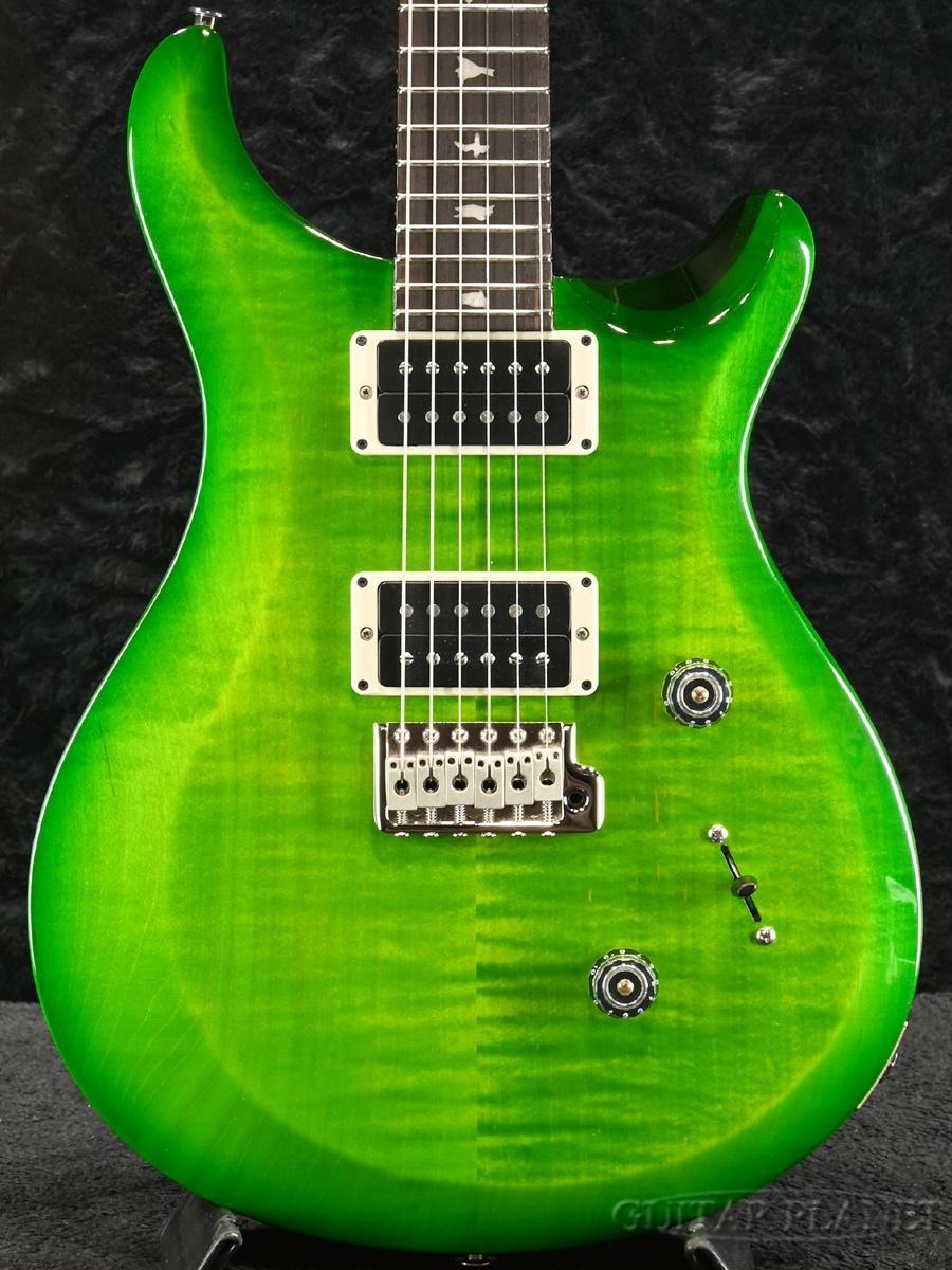 2023年製　正規輸入品 8月某日に催されたPRSのディーラー向け選定会。 現地には100本以上のUSA製モデルが陳列され、現物を確認しながら製品を発注することができました。 そんな中弊店スタッフが選んだうちの一本が、S2シリーズ10周年を記念し、世界1000本限定にて販売された「10th Anniversary S2 Custom 24 Limited Edition」。 鮮やかなグリーンのグラデーションが目を惹くEriza Verdeフィニッシュのこの個体には、バックパネルにPaul Reed Smith氏の直筆サインを書き込んでいただきました。 こちらの直筆サイン入り個体は勿論のこと、10th Anniversary S2 Custom 24モデル自体も生産が完了しており、今後の入荷はないため、この機会をぜひお見逃しなく！ S2シリーズは、PRSが持つギター製造のスキルや経験、細部への拘りをよりシンプルかつストレートに表現したデザインで、2013年に誕生しました。 S2 Custom 24を含む3つのラインナップから始まったこのシリーズには、この10年でトータル10種類以上ものモデルが加わりました。 そして、今回の10th Anniversary S2 Custom 24は、S2シリーズの誕生10周年を祝うのにふさわしい特別なモデルに仕上がりました。 ​このS2 Custom 24では、メイプルトップ、マホガニーバック、25インチスケール、24フレット、パターン・シン・ネック、PRS特許のモールド・トレモロといった基本的なスペックは従来のモデルを踏襲しつつ、アニヴァーサリーモデルの特別な仕様として、ネックにはキューバン・マホガニーを採用し、マザー・オブ・パールのバード・インレイが施され、USA製85/15ピックアップが搭載されています。 PRSはサウンドやデザイン含め、ピックアップの研究に膨大な時間を費やしてきましたが、今回TCIプロセスを経て搭載されるピックアップは、ペダルボードを駆使したサウンドメイキングを主に行う場合、または直接アンプにプラグインした場合、そのどちらにおいても、芳醇かつ透明感のあるバランスのとれたサウンドを創出します。 また、USA製の85/15ピックアップが、S2のラインナップにおいて1ヴォリューム、1トーン、5wayブレードスイッチの組み合わせと共にS2シリーズに搭載されるのは今回が初となります。 ​10th Anniversary S2 Custom 24は、1000本のみの限定生産となります。 メリーランド州のStevensvilleにあるPRSのファクトリー内に作られた2番目の生産ライン「Stevensville 2」という意味で名付けられ、新たな製造方法を卓越した品質管理と製造技術と組み合わせて新たな価格帯のラインナップとして稼働を開始したS2シリーズは、この10年でビジネス規模が大きく成長し、現在は製造過程の一部がCoreモデルとBolt-Onモデルの生産ラインに統合されています。 SPEC Top Wood: Maple Back Wood: Mahogany Number of Frets: 24 Scale Length: 25 Neck Wood: Mahogany Fretboard Wood: Rosewood Neck Shape: Pattern Thin Fretboard Inlays: Birds Bridge: PRS Patented Tremolo Tuners: PRS Low Mass Locking Hardware Type: Nickel Treble Pickup: 85/15 Bass Pickup: 85/15 Pickup Switching: Volume and Tone Control with 5-Way Blade Pickup Switch Case : S2/CE/Bolt-On Gig Bag /_/_/_/♪出荷前調整ご要望承ります♪_/_/_/_/ ギタープラネットではご注文頂いた商品は 新品中古問わず検品・調整してから出荷致します。 弦高など細かなセッティング等、お好みに 合わせて調整も可能ですで、お気兼ねなく お申し付けくださいませ。 /_/_/_/_/_/_/_/_/_/_/_/_/_/_/_/_/_/_/_/_/_/ お問い合わせダイヤル：03-3259-0031 ※掲載画像は、カメラの特性やディスプレイなどの影響により、実際に肉眼で見える色合いと差がある場合がございます。 ※掲載商品売却に対応した在庫表示の反映は迅速を心がけておりますが、 タイムラグが発生する場合がございます。予めご了承ください。　