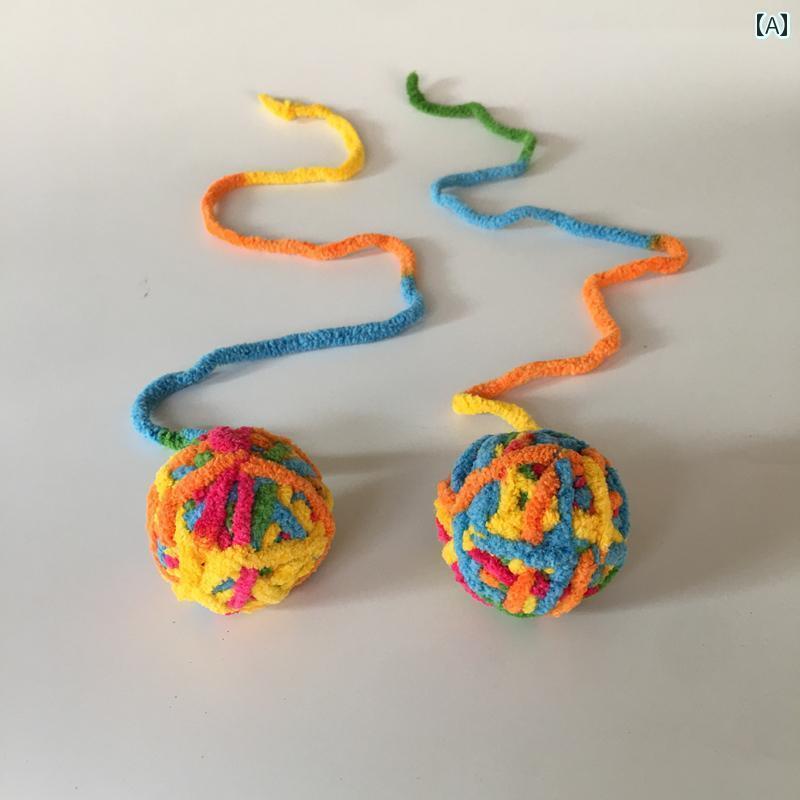 猫用 おもちゃ かわいい 猫の おもちゃ ウール レインボー ボール 猫を 楽しませる 尾 付きの 編み込み ペットの ボールには 鳴る ビーズ サウンド ボールが 含まれています