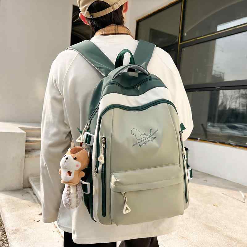 リュックサック 男女兼用 小学生 中学生 スクールバッグ ストリート シンプル 大容量 カジュアル 通学 通勤 デイリーユース ナイロン 軽量 撥水加工 通気性 負担軽減 耐摩耗性 脊椎保護