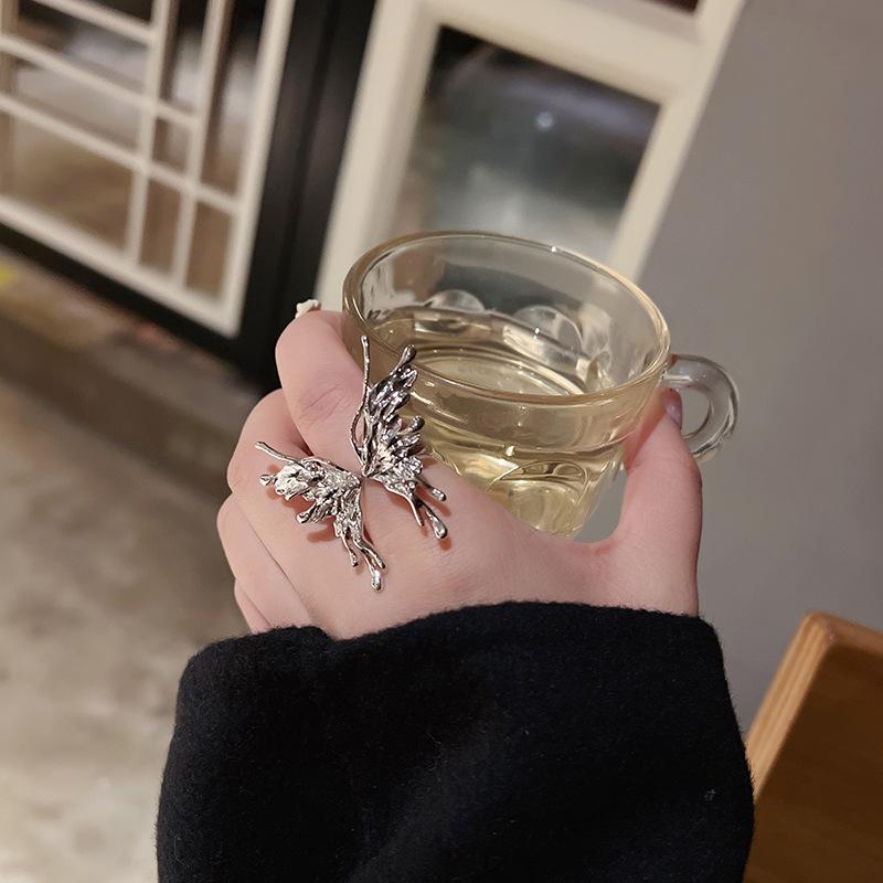 指輪 ユニセックス 蝶モチーフ バタフライデザイン 流体 リキッドメタル 個性派 ユニーク シンプル インスタ映え おしゃれ オープンリング サイズ調整可能 銅製 電気メッキ シルバー