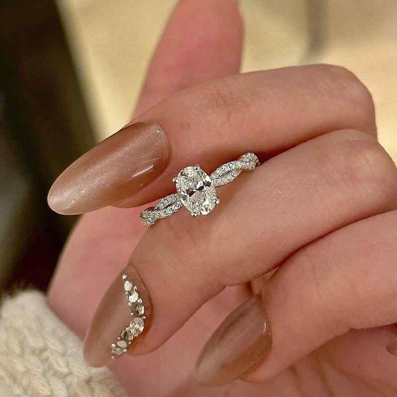 指輪 レディース 輝く アイスフラワーカット オーバル ジルコニア 回転 パヴェ ツイスト シンプル エレガント オープンリング 銅製 普段使い