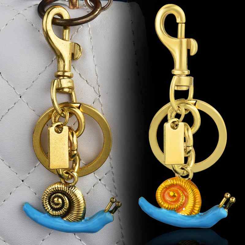 バッグチャーム レディース カタツムリ キーホルダー 海の生き物 海螺 貝殻 モチーフ 鞄 アクセサリー ..