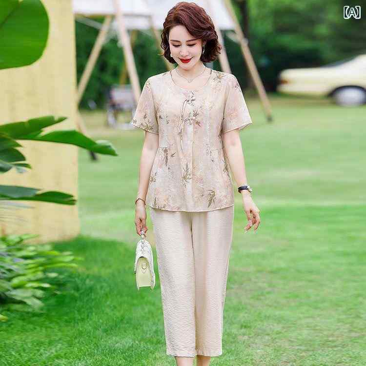 セットアップ レディース ミセス 中高年 女性向け 春夏 半袖 花柄 プリント ゆったり ルーズシルエット 七分丈パンツ 上下 2点セット 切り替え おしゃれ 上品 エレガント ポリエステル 普段使い お出かけ リラックスウェア