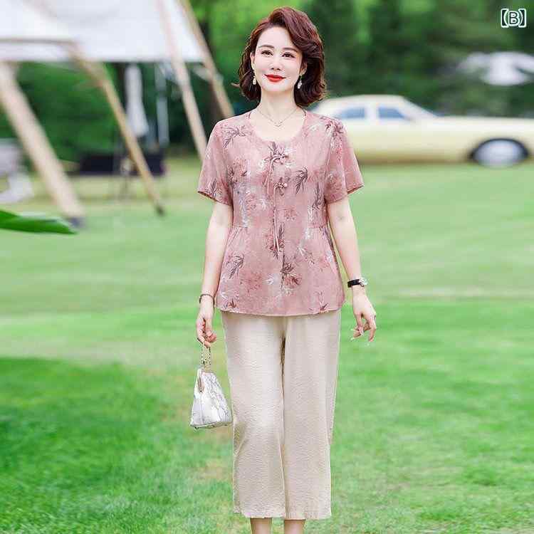 セットアップ レディース ミセス 中高年 女性向け 春夏 半袖 花柄 プリント ゆったり ルーズシルエット 七分丈パンツ 上下 2点セット 切り替え おしゃれ 上品 エレガント ポリエステル 普段使い お出かけ リラックスウェア