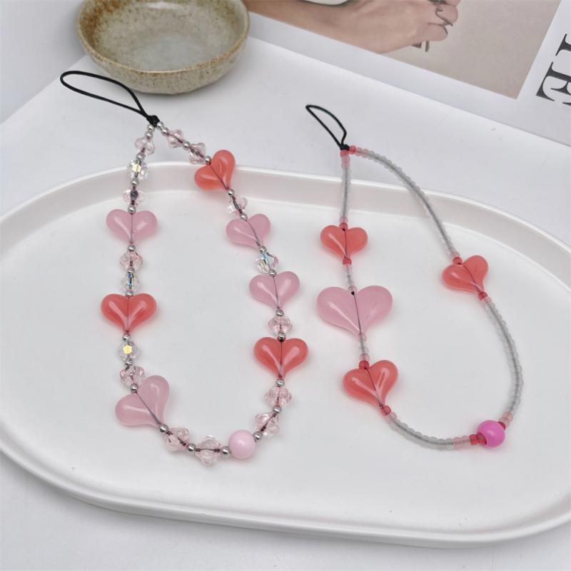 携帯ストラップ レディース かわいい クリスタル スマホチェーン リストバンド ピンク 夏 インスタ映え カメラチャーム レジン ガラス製 普段使い おしゃれ フェミニン