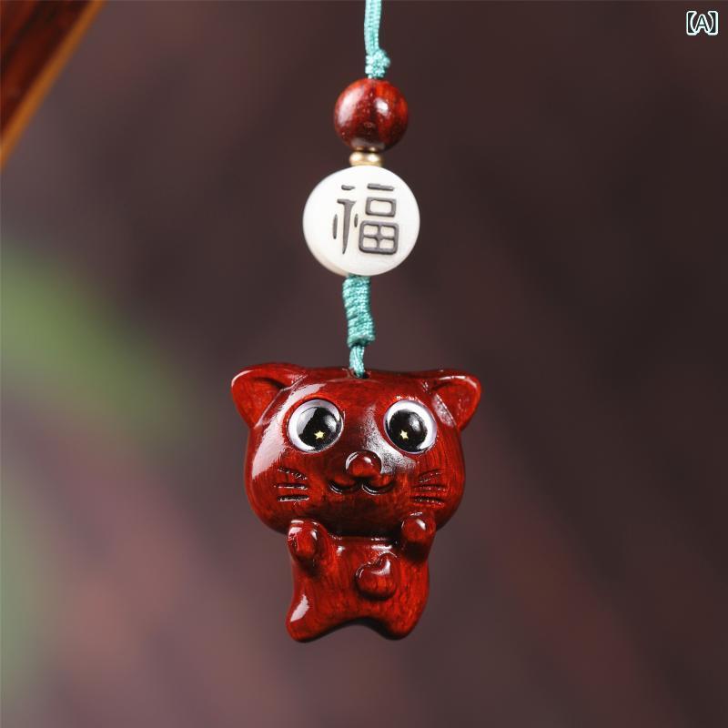 ・素材: 木質・工芸: 彫刻・スタイル: ユニセックス・デザイン: 動物・機能: 装飾・種類: ダンシングキャット-紫檀、ダンシングキャット-緑檀、ダンシングキャット-白檀・カテゴリ: 携帯ストラップ