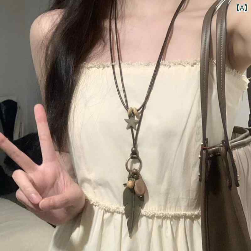 ネックレス レディース ロングネックレス 羽 フェザー 民族風 ペンダント 二連 蝋引き紐 コットン エスニック レトロ アジアン アクセサリー おしゃれ シンプル カジュアル 大ぶり 長め ギフト プレゼント 贈り物