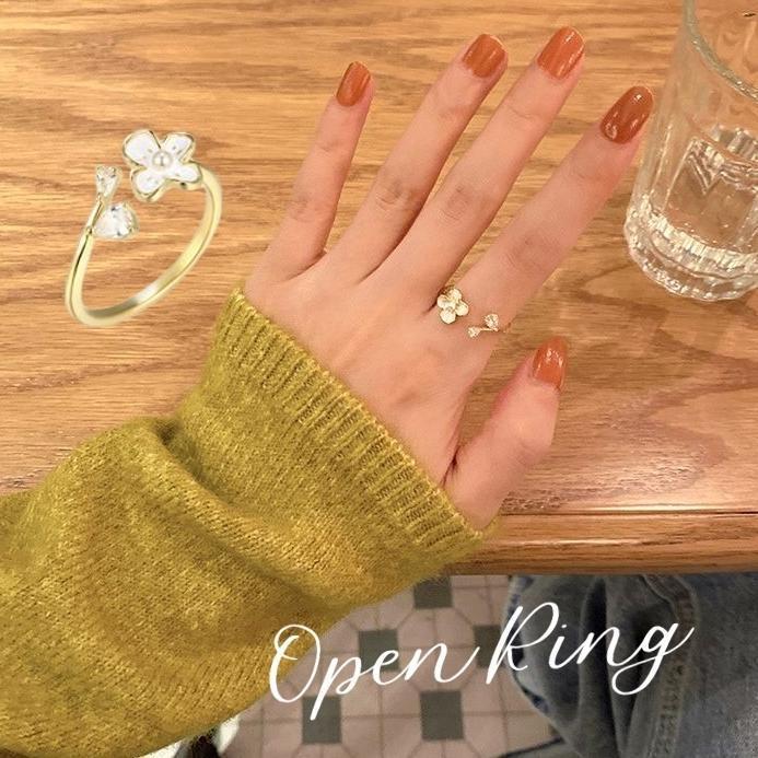 指輪 リング フリーサイズ 単品 アクセサリー レディース オープンリング ゴールドカラー お花モチーフ フラワーモチーフ 華奢 シンプル 高見え 高