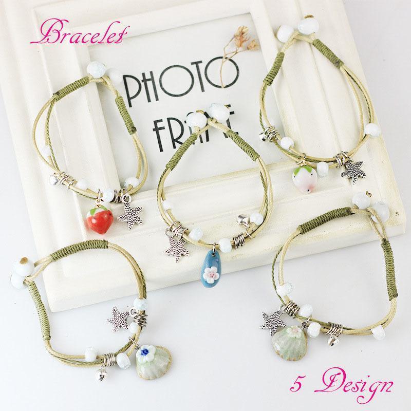 ブレスレット アクセサリー ファッション小物 レディース ワックスコード シェル イチゴ 磁器 モチーフ 調節可能 かわいい おしゃれ