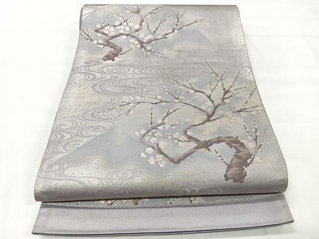未使用品　高級吉村織物袋帯　光る素材のベージュに桜の花びら　変わり円と波文様　粋 未使用品高級吉村織物袋帯光る素材のベージュに桜の花びら変わり円と波