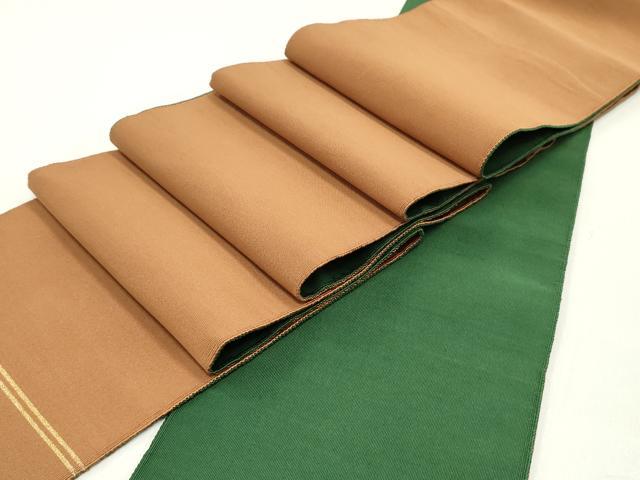 ■■■　サイズ　■■■ 長さ 334cm 幅 15.5cm程 ■■■　商品詳細　■■■ 【正絹】 状態は接写画像のように表地、裏面に汚れがございますが その他特に目立ったシミ汚れなどもなく大変良い状態です。 爪で糸を1本1本掻きよせて織る爪つづれは 「日に寸、五日に寸、十日に寸」と伝えられるほどの 月日と高度な技術が必要であり複雑な文様になると 1日にわずか1cmしか織り進めないものもあります。 そのため極めて生産数も少なく希少価値の高い織物となっています。 元来生産数の少ないうえに職人さんの高齢化と後継者不足にともない 高度な技術をもった織師は年々減少している爪織本綴れ。 大変上質な逸品になります。 お安く出品致しますので、是非この機会にいかがでしょうか？ ※両側未かがりですが着用には問題ありません。 ■■■　注意事項　■■■ ■モニター発色の具合により色合いが異なる場合がございます。 ■寸法は多少の誤差が生じる場合がございますのでご了承ください。 ■縫込みの長さが左右非対称の場合は短い部分を記載しております。 左右非対称であってもご返品・お値引き等の保証は出来かねますので、ご了承の上ご購入をお願い致します。 ■シミ等のチェックには注意を払っておりますが、見落としがある場合もございますし、個人の見解も様々ですので神経質な方のご購入はお控えください。 ■箪笥に入っておりました着物や帯なので畳みシワや匂いがあるものもございます。 ■お休みは基本的に土日祝となりますが、その他臨時でお休みする場合がございますのでご了承ください。 ■商品の発送は平日のみの発送となります。 ■夜間と土曜、日曜日はお問い合わせの回答が遅れる場合がございます。 ■当店では、お直し、紋入れ、お手入れ等は承っておりません。 ■生地の状態（ヤケ、経年劣化等）によってはサイズ直しが出来ない場合がございます。 その点もどうかご了承のうえ、ご購入をお願いいたします。 ■弊社で取り扱う商品は一点ものにつき、時期や在庫状況に応じて金額が変更となる場合がございます。 ■検針は行っておりません。予めご了承いただきますようお願いいたします。 ■【洗える着物】と記載のある商品におきましては、商品お届け後に洗濯を行ってしまってからのご返品にはご対応しかねます。 念の為、専門店でのお手入れをお願いいたします。 ■着物のサイズ目安は下記を参考ください↓ ＜女性着物＞　お端折り次第で＋5cm　−1cmが着用可能サイズ 　例）身丈170cmの場合、身長160cm〜175cm ＜男性着物＞　身丈＋約25cm〜27cm程が適応身長 　例）身丈155cmの場合、身長180〜182cm